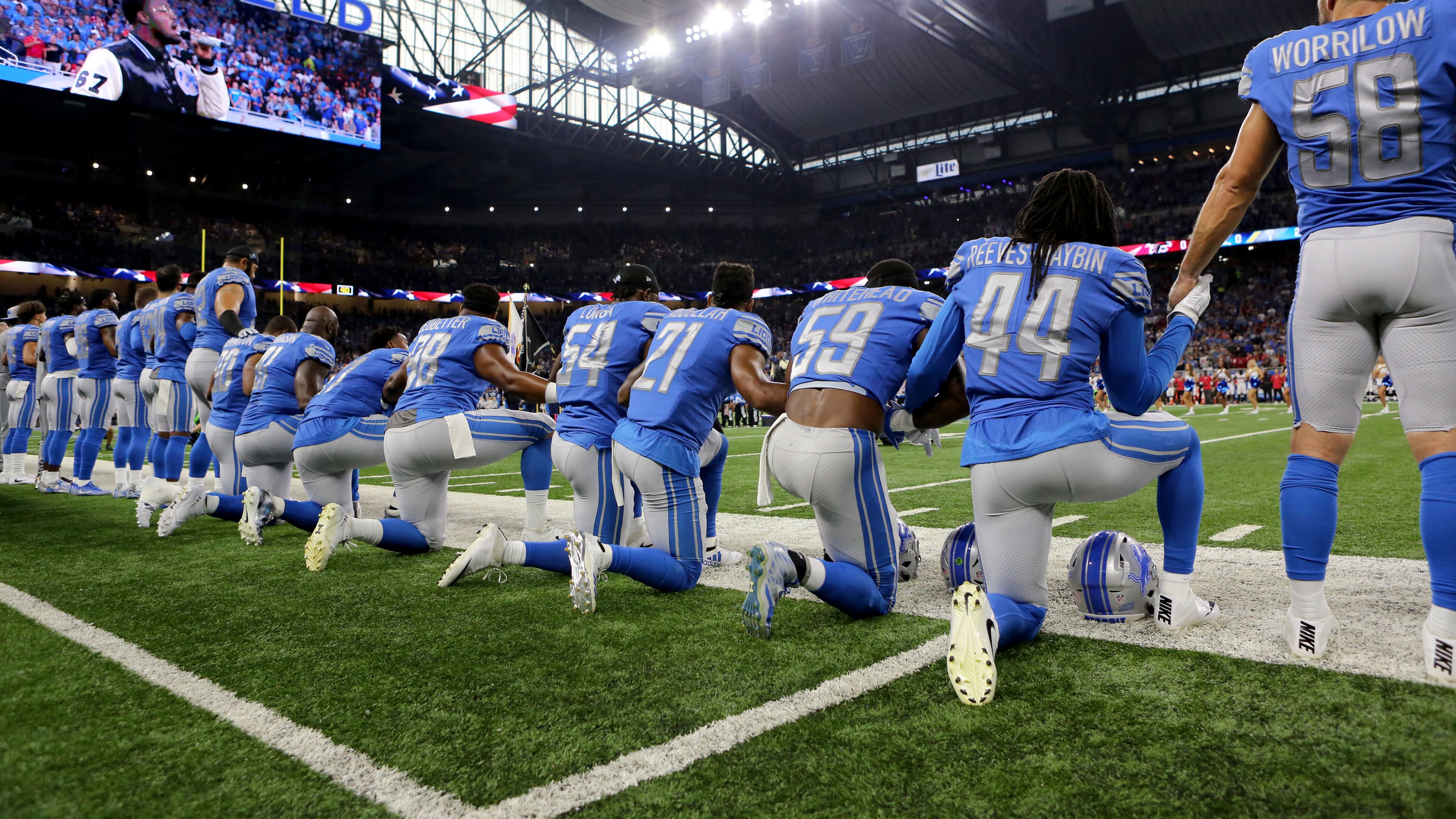 Members of the Detroit Lions take a knee during the playing of the national anthem prior to the start of the game against the Atlanta Falcons at Ford Field on September 24, 2017 in Detroit, Michigan. (Photo by Rey Del Rio/Getty Images)