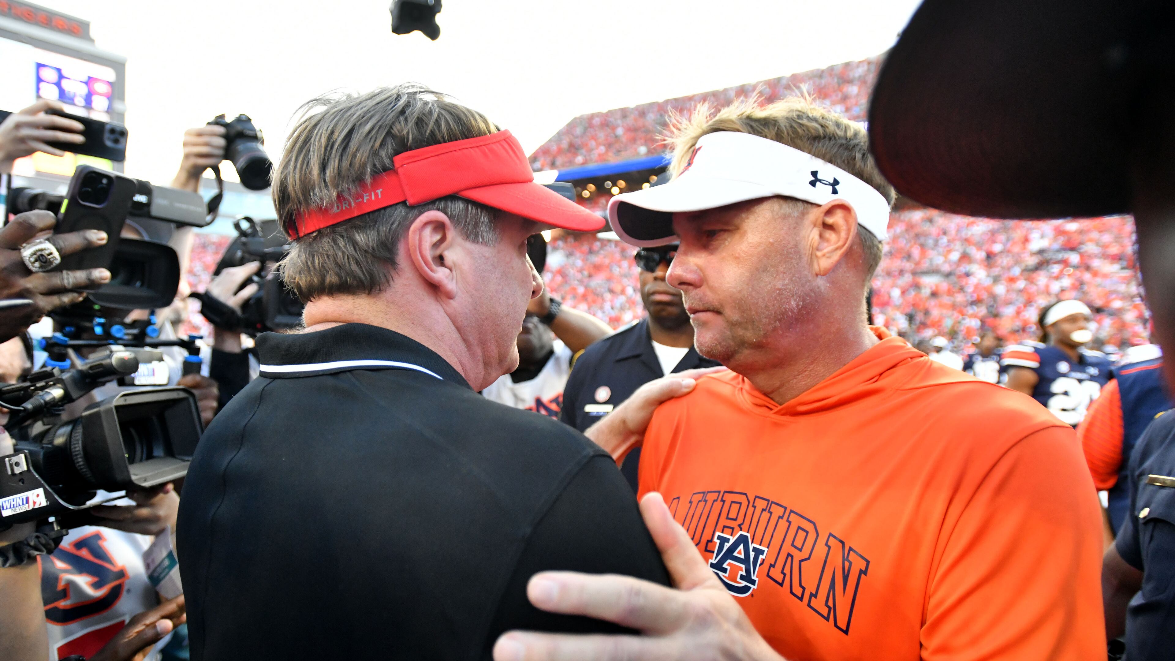 Georgia head coach Kirby Smart and Auburn head coach Hugh Freeze shake hands afterGeorgia beat Auburn in an NCAA football game at Jordan-Hare Stadium, Saturday, September 30, 2023, in Auburn, Alabama. Georgia won 27-20 over Auburn. (Hyosub Shin / Hyosub.Shin@ajc.com)