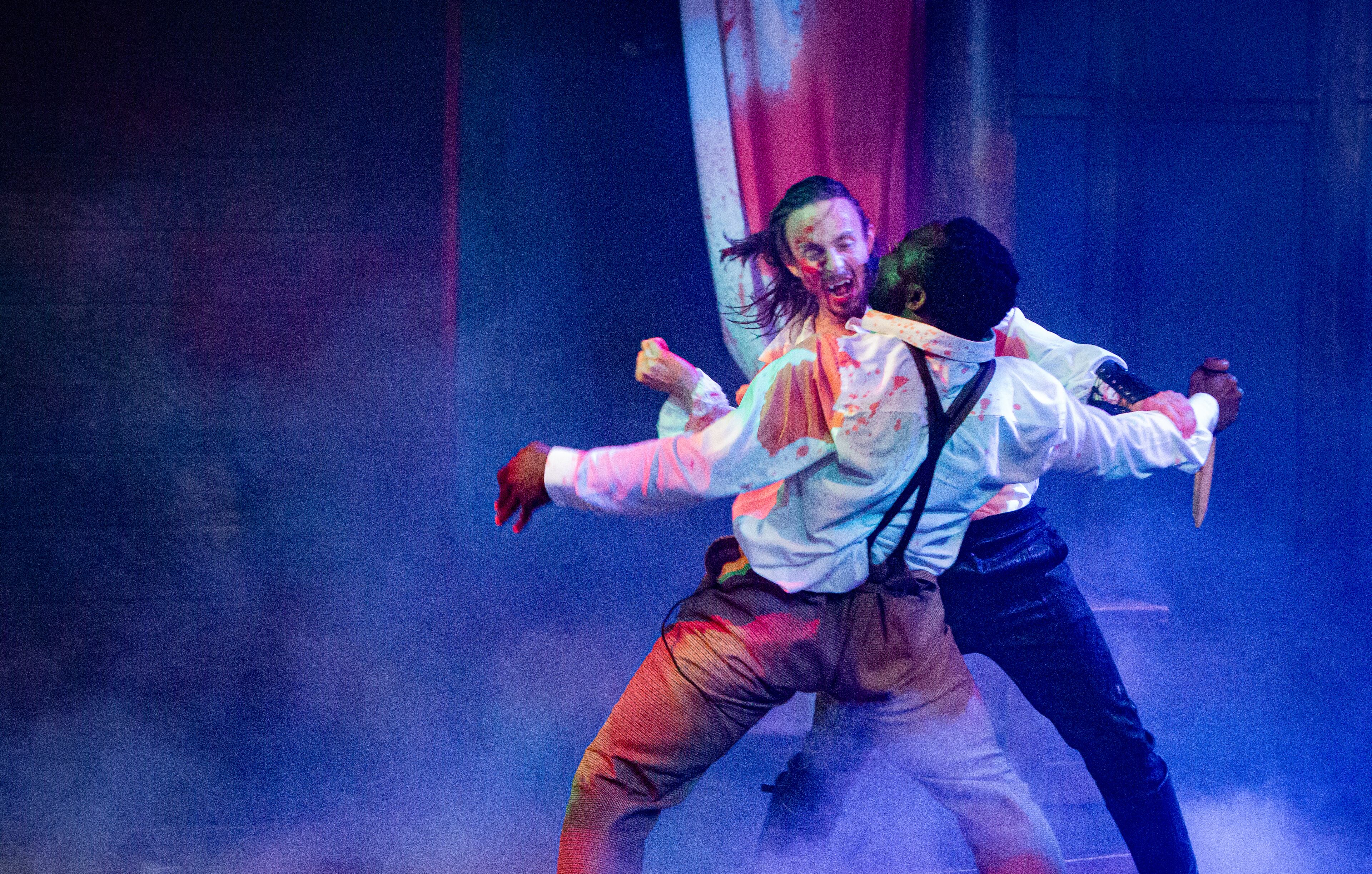 Benedetto Robinson (facing forward) as Dracula in mortal combat with Daryel T. Monson as John in Atlanta Shakespeare Company's “Dracula: The Failings of Men.”