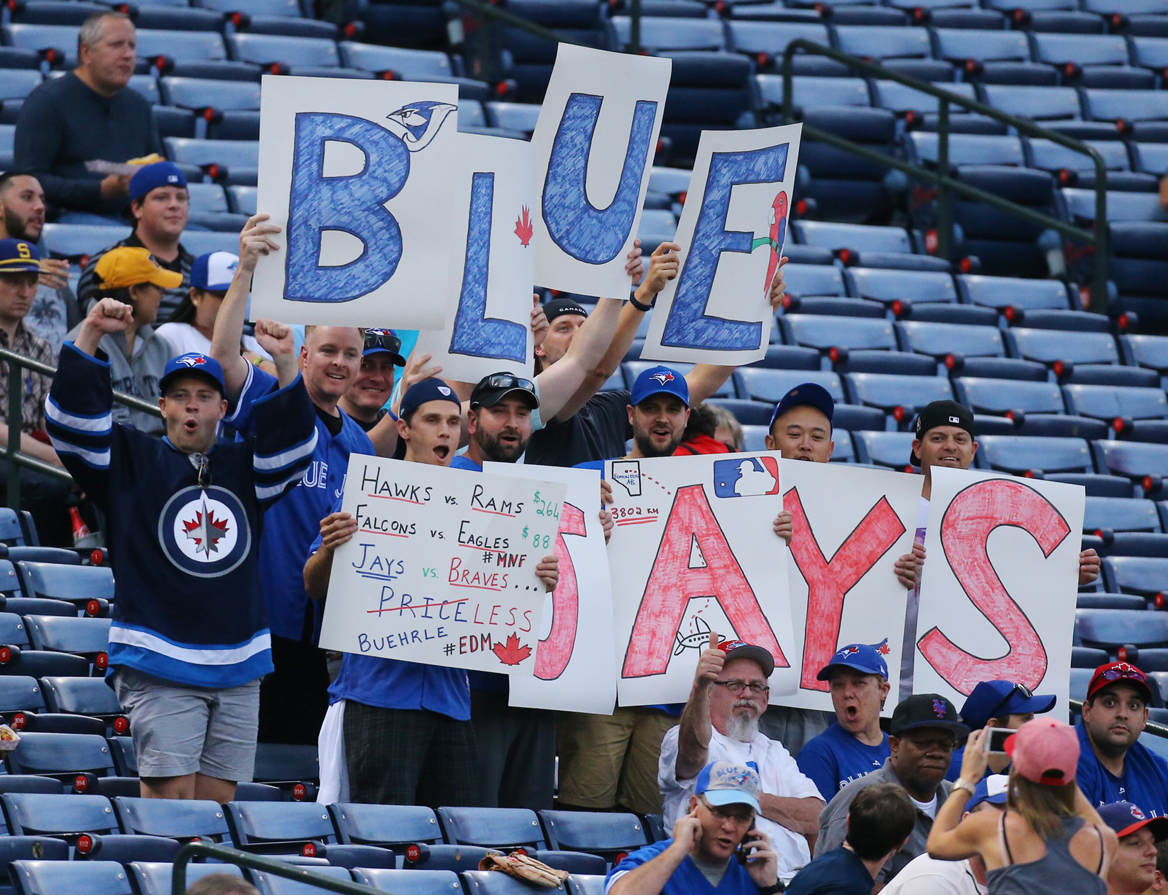 091515 ATLANTA: Blue Jays fans cheer their team during the first inning against the Braves in a baseball game on Tuesday, Sept. 15, 2015, in Atlanta. Curtis Compton / ccompton@ajc.com