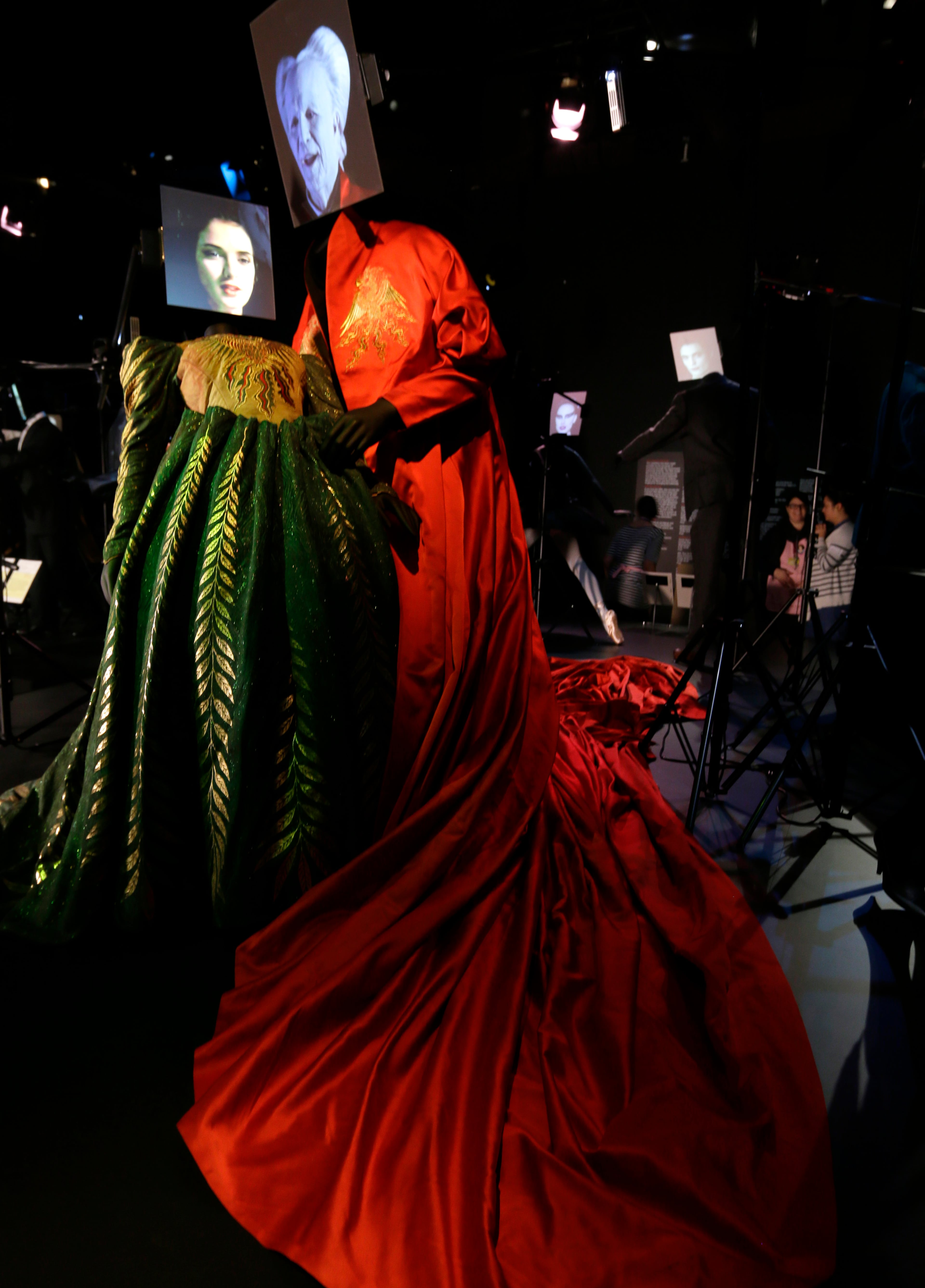 Two costumes made for the 1992 film Bram Stoker's Dracula, by designer Eiko Ishioka, showing a dress worn by the characters Mina Murray/ Elizabeth played by actress Winona Ryder and the red cape worn by Count Dracula played by actor Gary Oldman.