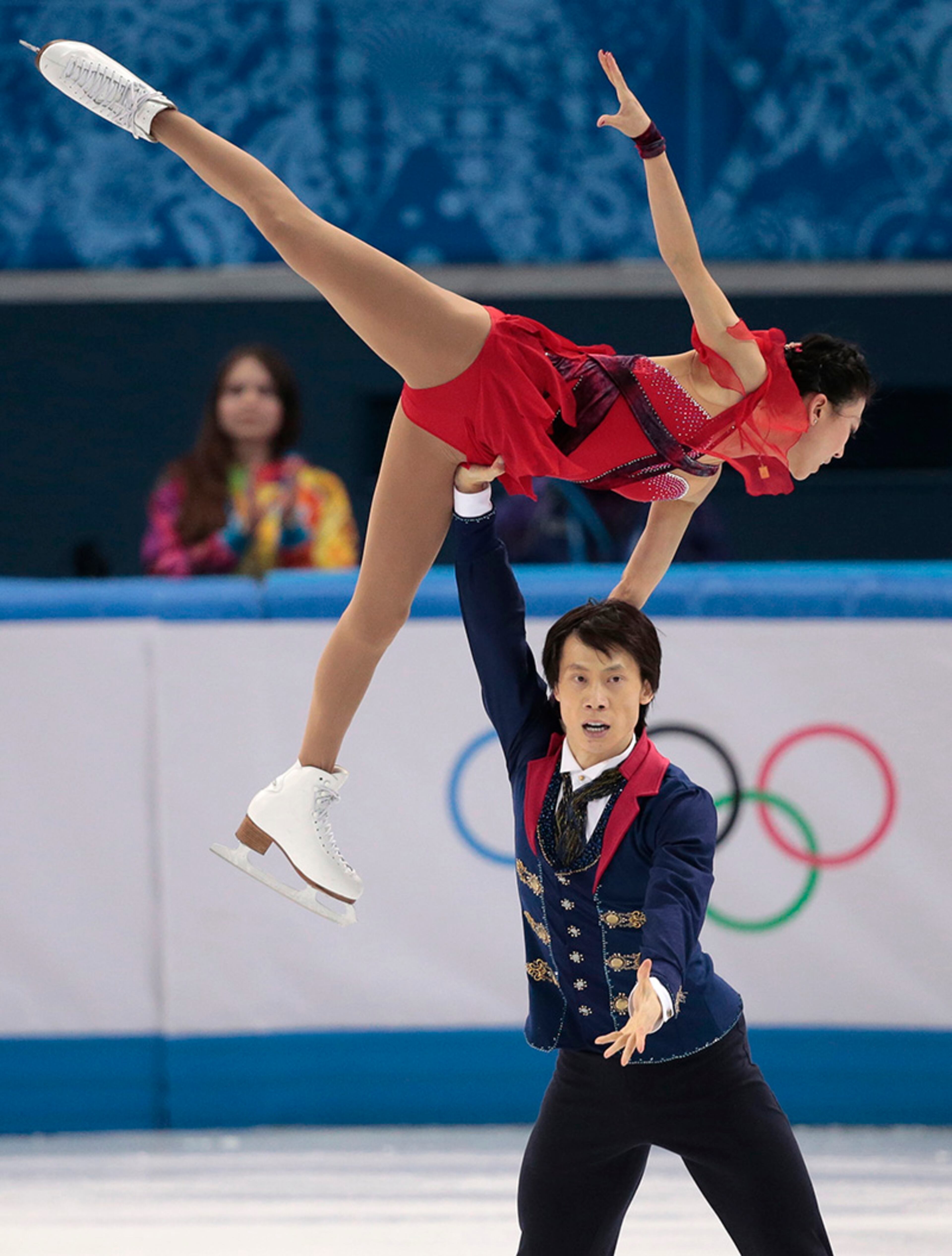 Pang Qing and Tong Jian of China compete in the pairs free skate figure skating competition at the Iceberg Skating Palace during the 2014 Winter Olympics, Wednesday, Feb. 12, 2014, in Sochi, Russia.