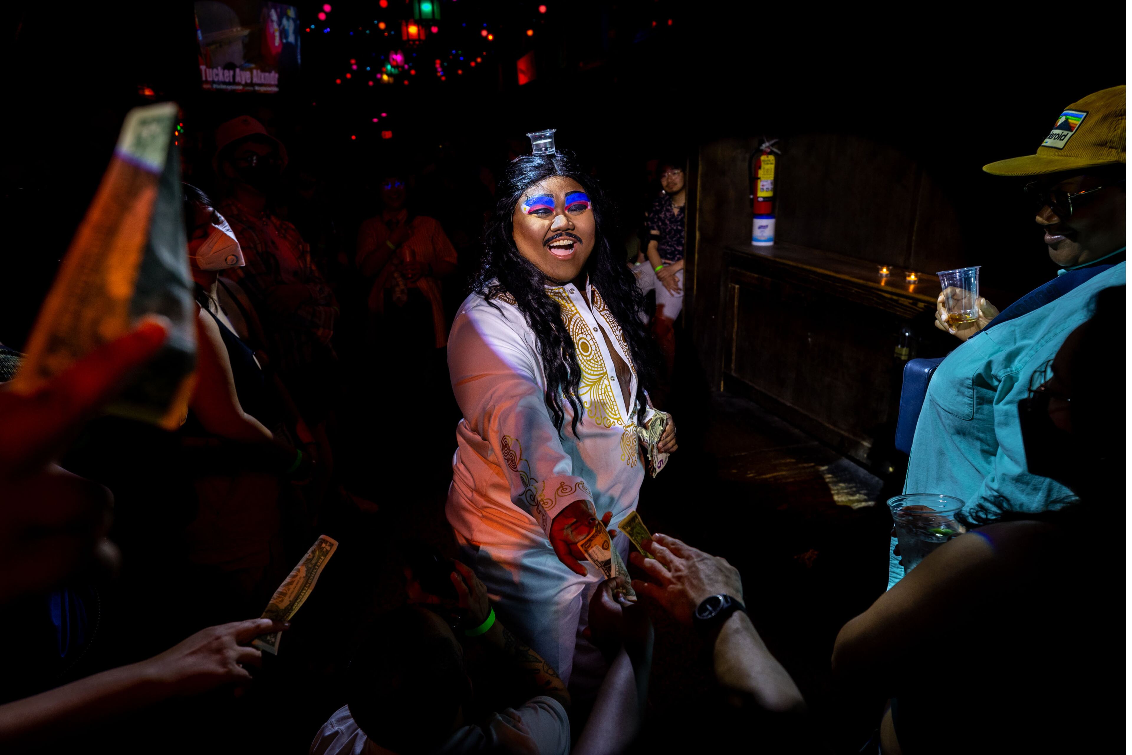 At Mary’s gay bar in East Atlanta Village, Tucker performed the Pandanggo sa ilaw for Asian American and Pacific Islander heritage month in May.