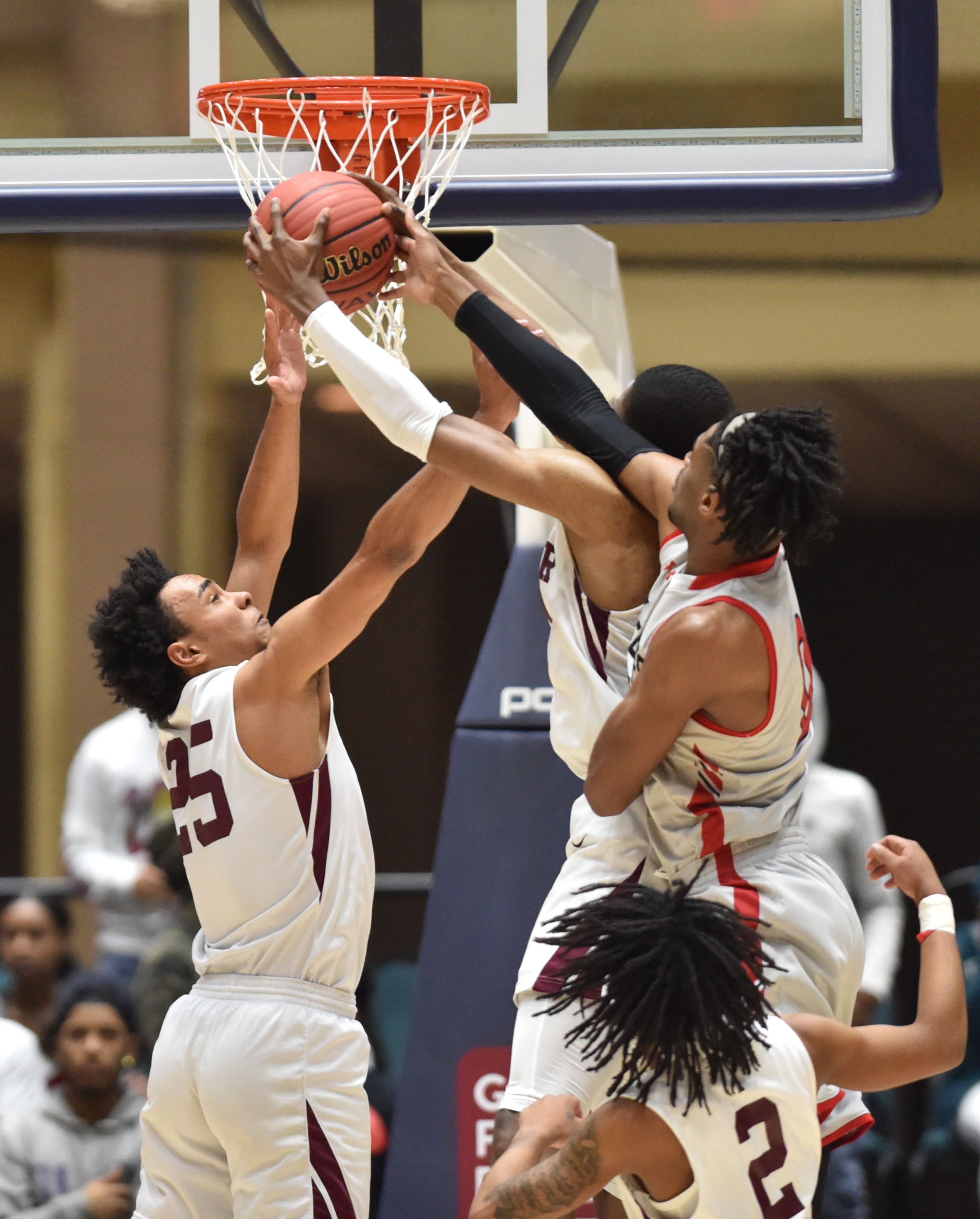 March 9, 2019 Macon - Tucker Nate Ogbu (10) grabs a rebound over Tri-Cities Demetrius Rives (right) in GHSA State Basketball Championship game at the Macon Centreplex in Macon on Saturday, March 9, 2019. HYOSUB SHIN / HSHIN@AJC.COM