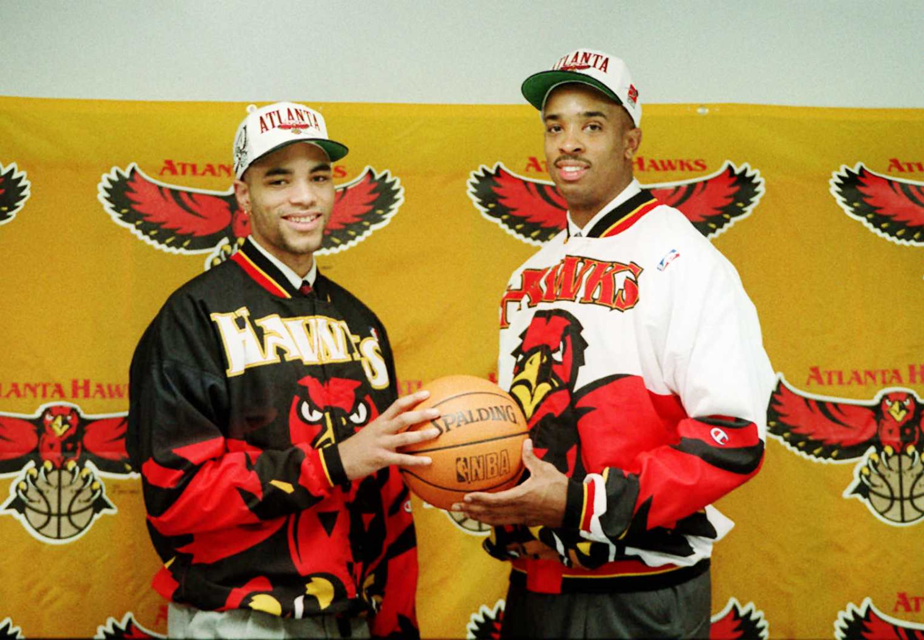 Hawks 1995 draft picks Donnie Boyce left of Colorado and Alan Henderson of Indiana pose for photographers. Henderson was taken in the first round, Boyce in the second.