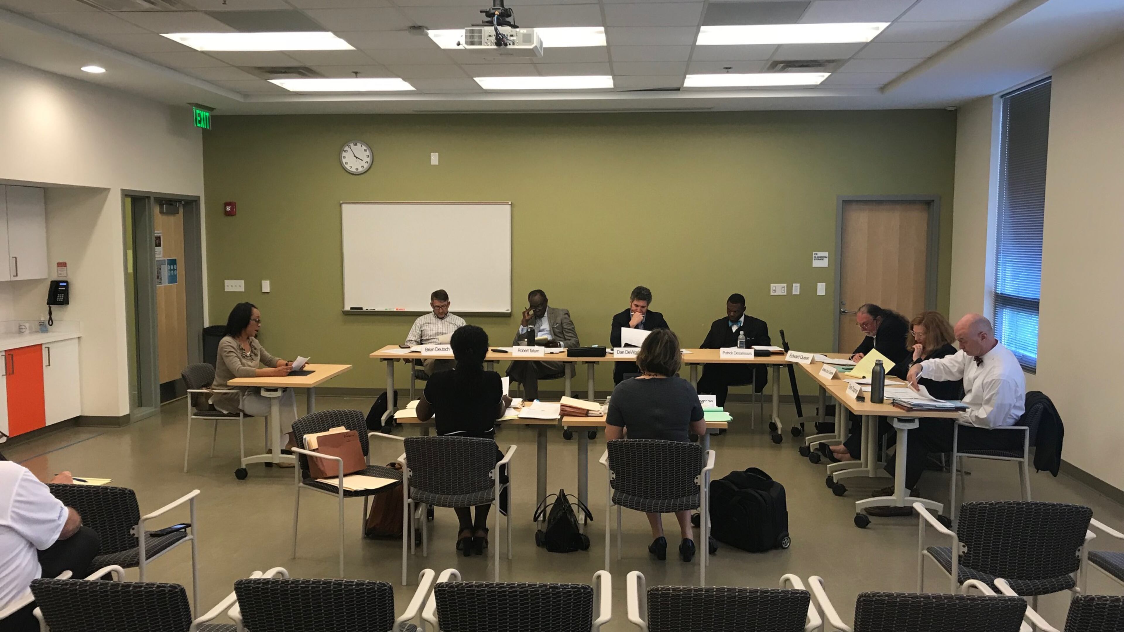 Kelly Cato, who once worked as an aide to former DeKalb Commissioner Stan Watson, testifies in an ethics hearing about whether he used secret funds to solicit money from county vendors.