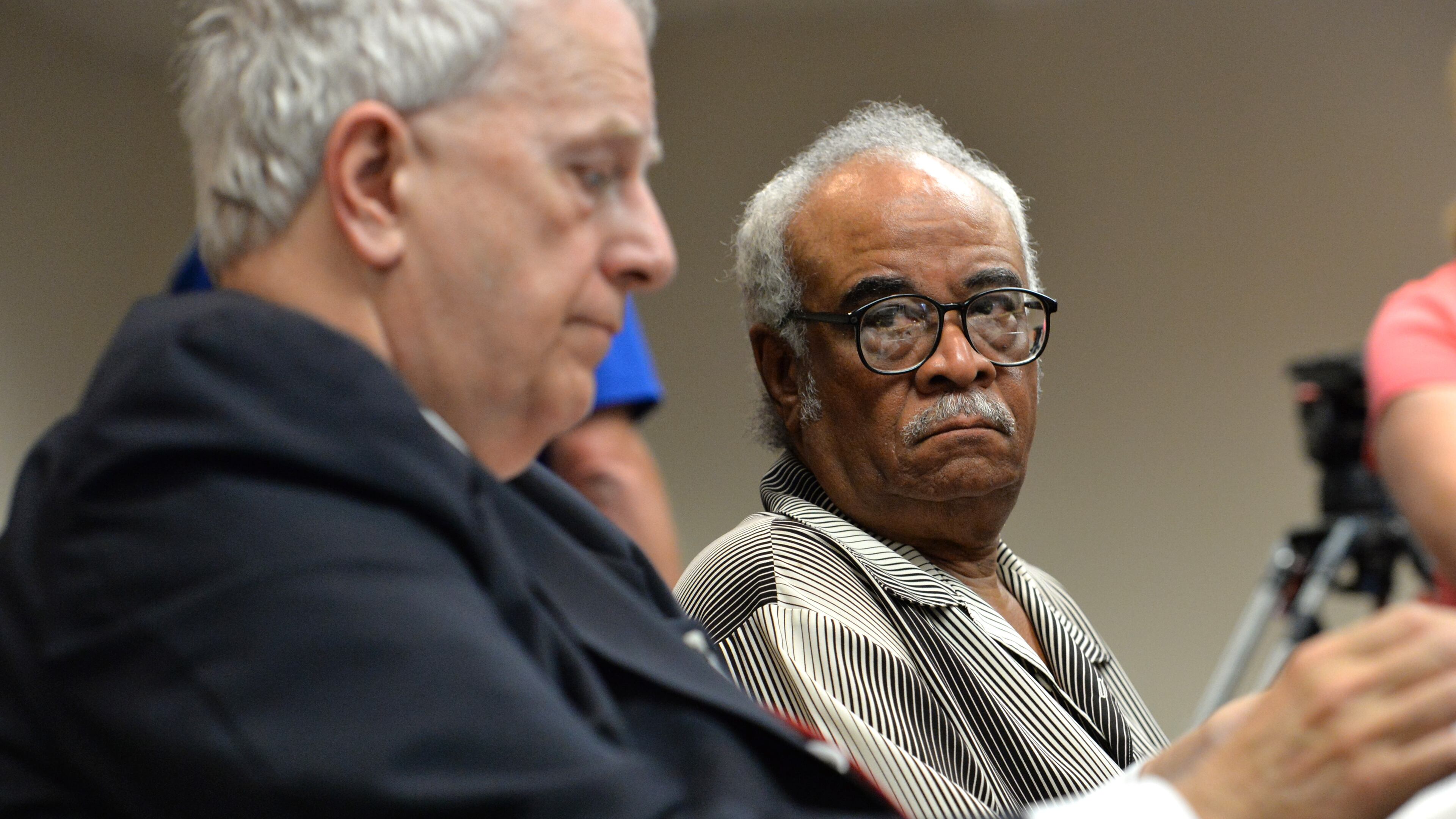 Former Gov. Roy Barnes (left) speaks to his client, Rep. Tyrone Brooks, during a hearing in 2013. Brooks pleaded guilty to one count of tax fraud on Thursday, and he pleaded no contest to five other counts of wire and mail fraud. HYOSUB SHIN / HSHIN@AJC.COM