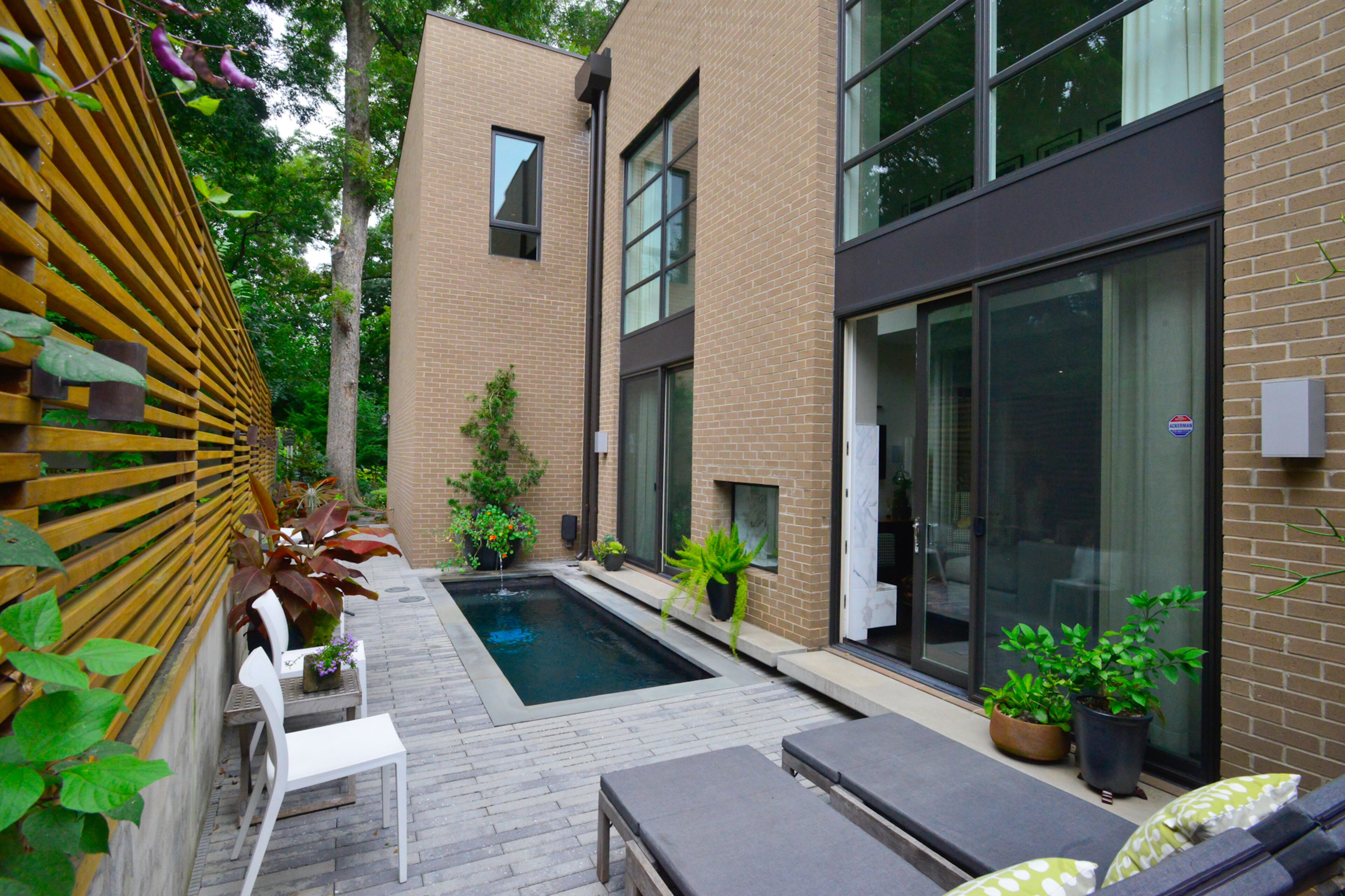 Favorite outdoor feature: Dipping pool and gardens. The 5-by-15-foot pool, accessed through sliding doors in the living room and by Neptune Pools, based in Sugar Hill, is just big enough to get wet and cool off, Harris said. Favorite architectural features: The use of brick and wood, which fits into the Old Fourth Ward neighborhood and is classic and timeless, they said. -- Text by Lori Johnston