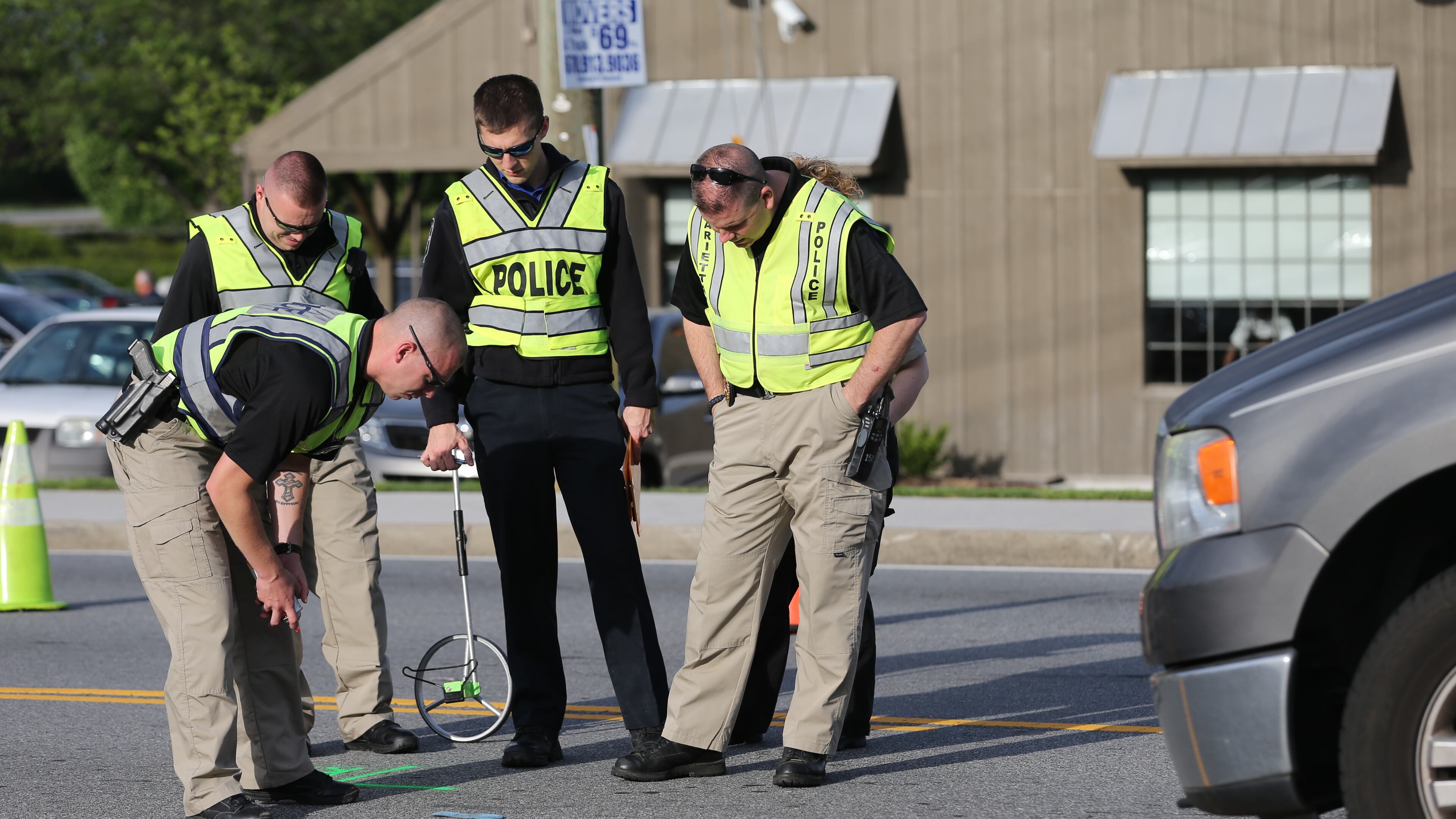Police investigate after a child was hit by a vehicle in Marietta on Thursday. (BEN GRAY / BGRAY@AJC.COM)