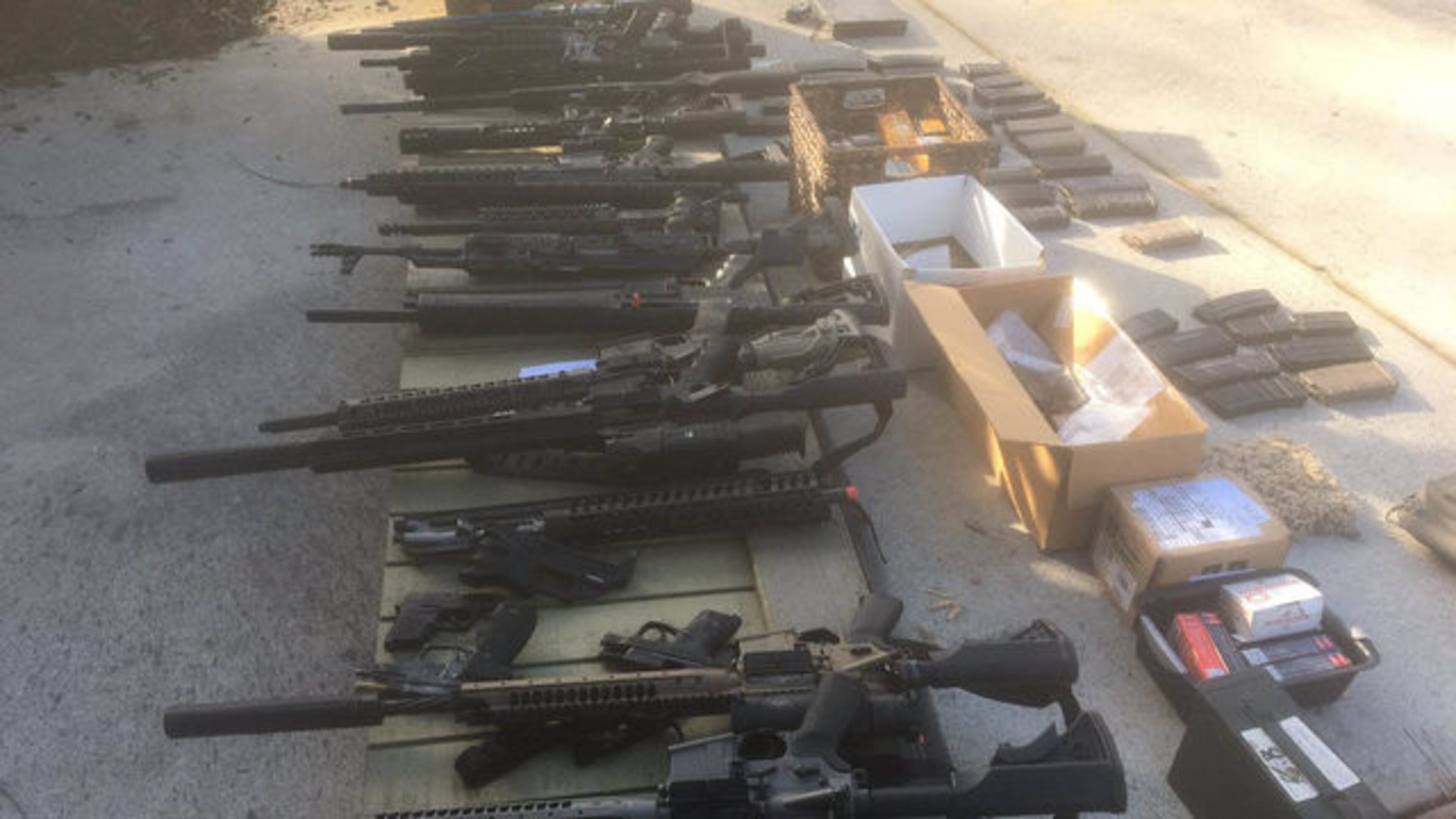 Investigators recovered a stash of weapons and ammunition at Roach’s house.