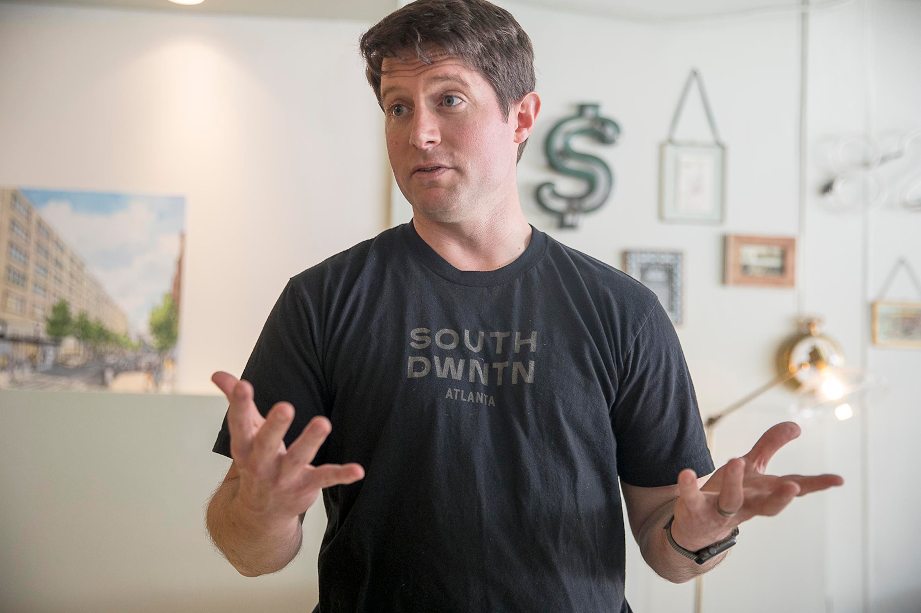 04/11/2019 -- Atlanta, Georgia -- Jake Nawrocki, President of Newport, speaks on the future development of Atlanta's South Downtown community during a "Pop-Up Row" shopping event along the 200 block of Mitchell Street SW in Atlanta's South Downtown community, Thursday, April 11, 2019. (ALYSSA POINTER/ALYSSA.POINTER@AJC.COM)