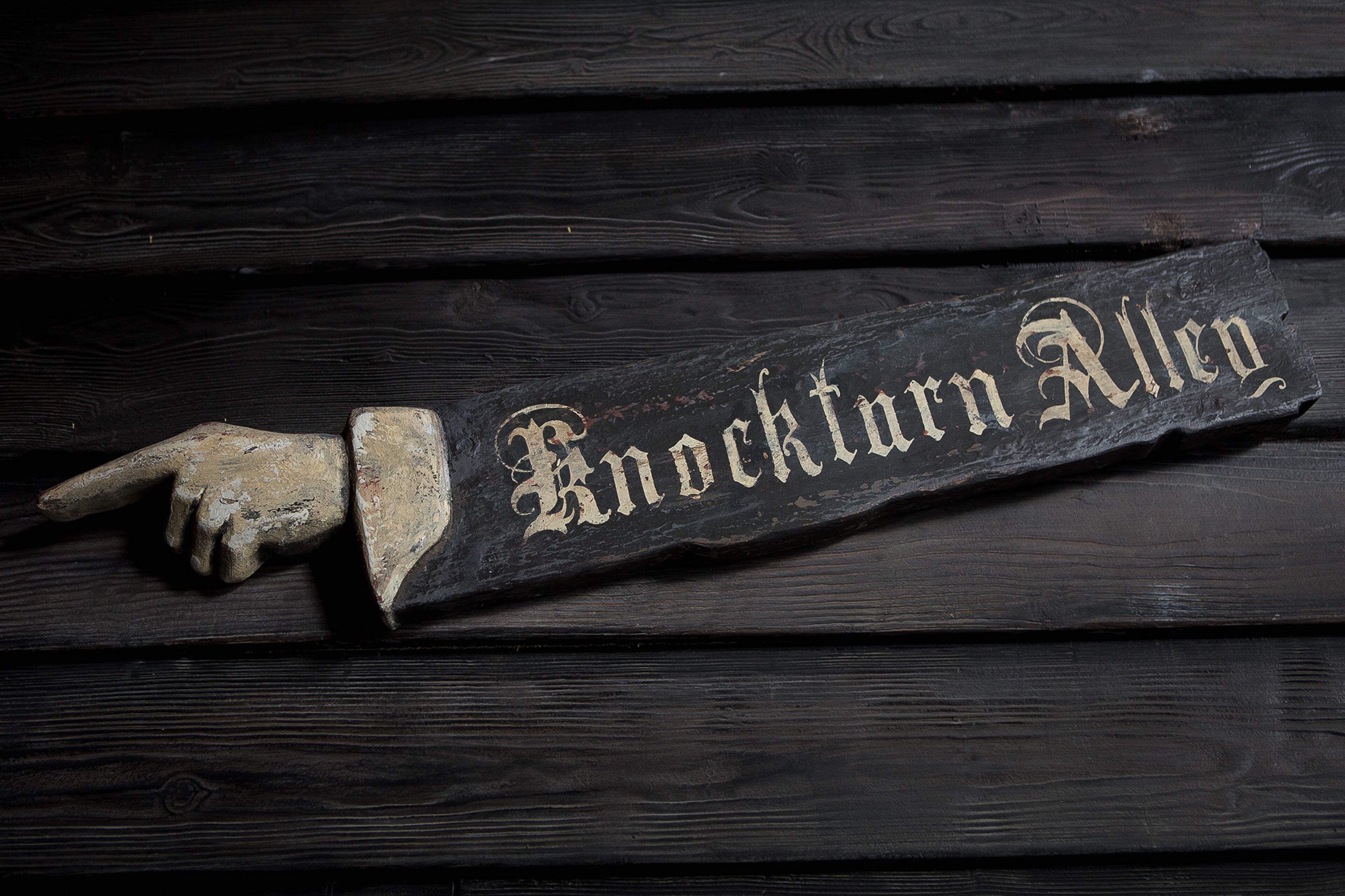 A sign points the way to Knockturn Alley in the Wizarding World of Harry Potter Diagon Alley on Thursday, June 19, 2014 at Universal Studios in Orlando. (Madeline Gray / The Palm Beach Post)