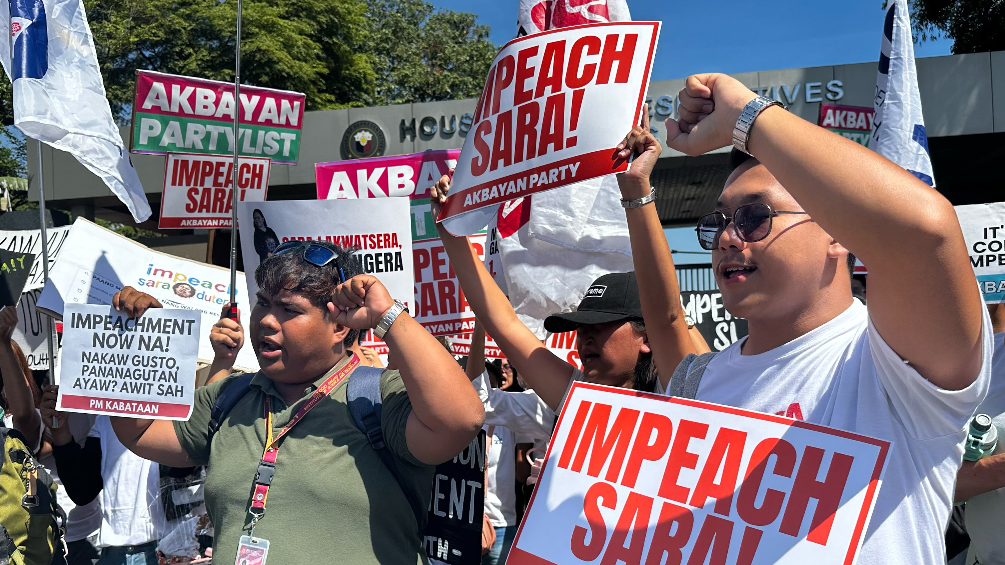 Protesters shout slogans during a rally calling for the impeachment of Philippine Vice President Sara Duterte outside the House of Representative in Quezon city, Philippines on Monday, May 11, 2026. (AP Photo/Joeal Calupitan)