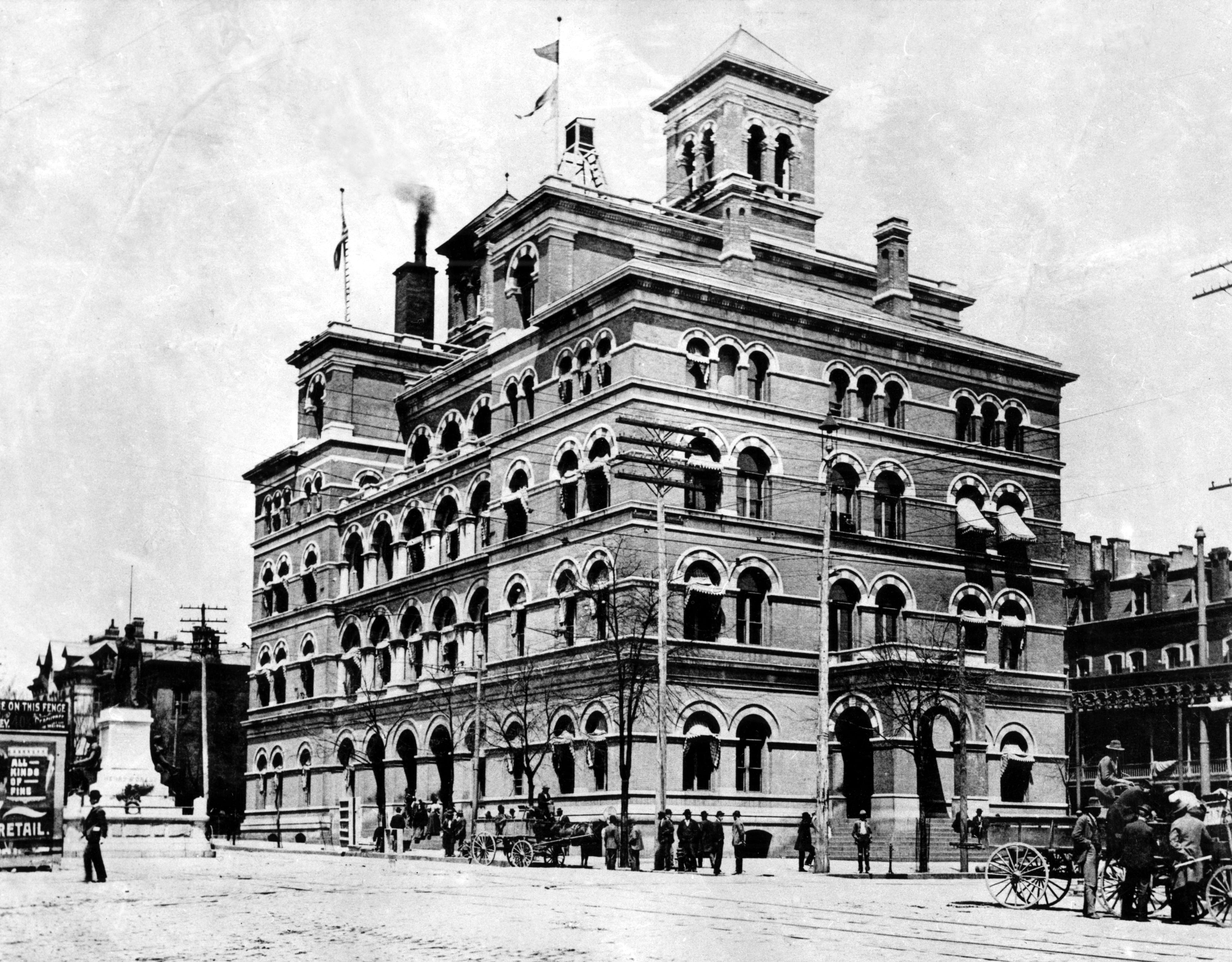 The U.S. Post Office and Custom House - shown in the 1890s (left center) at the corner of Marietta and Forsyth Streets. The building faces Marietta Street. (File) 1895