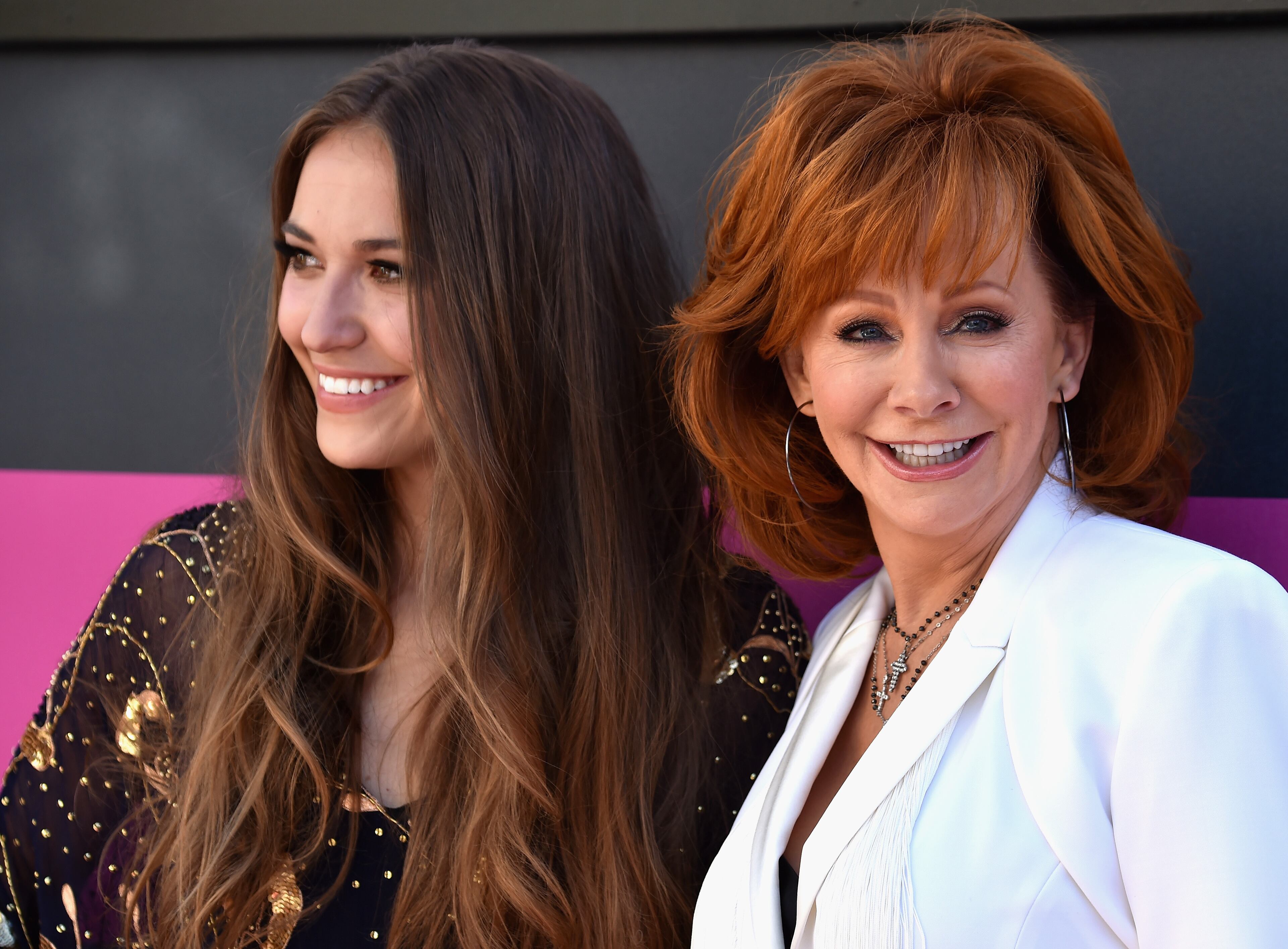 LAS VEGAS, NV - APRIL 02: Recording artists Lauren Daigle (L) and Reba McEntire attend the 52nd Academy Of Country Music Awards at Toshiba Plaza on April 2, 2017 in Las Vegas, Nevada. (Photo by Frazer Harrison/Getty Images)