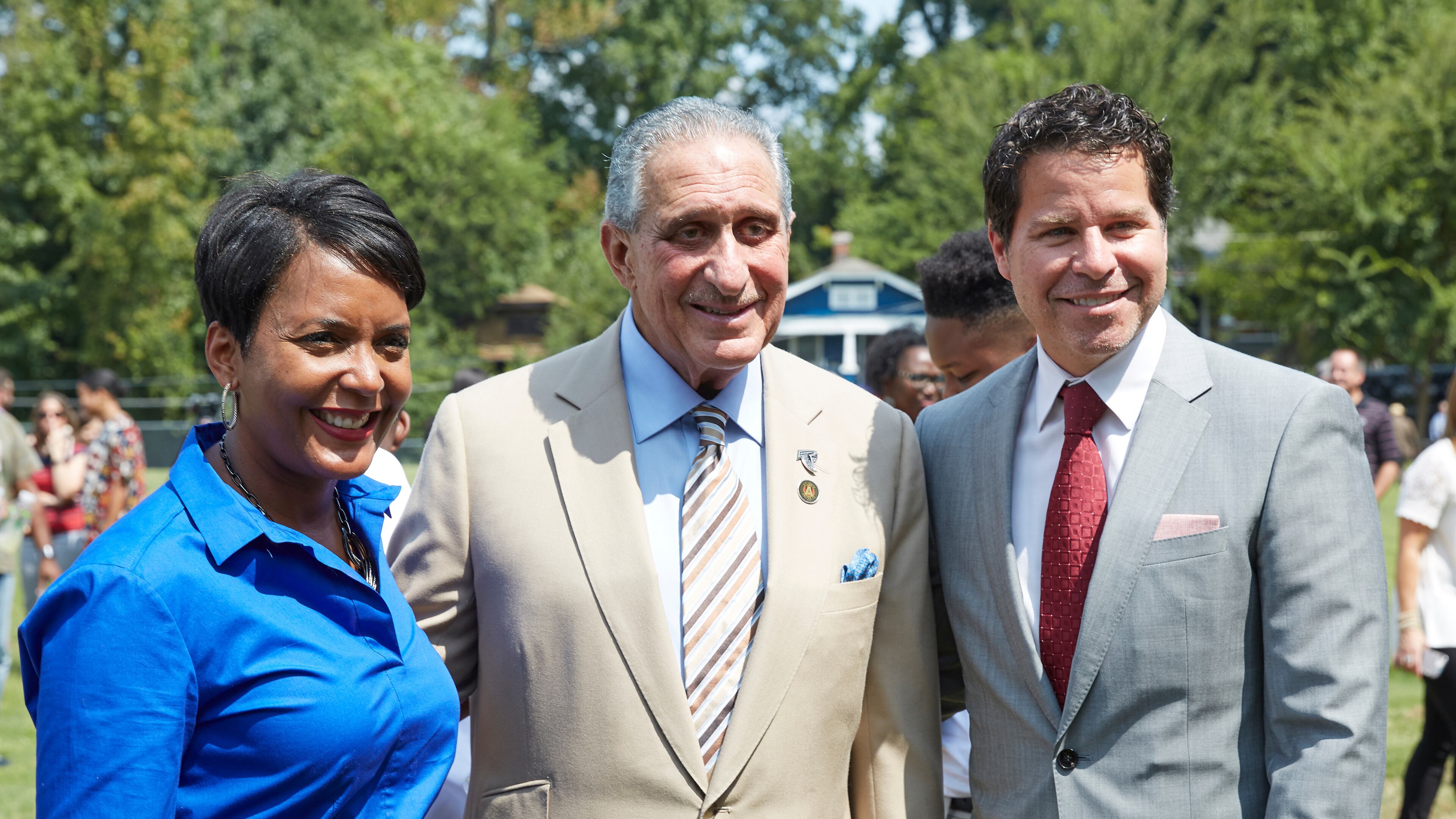 Atlanta Mayor Keisha Lance Bottoms, Falcons owner Arthur Blank and Atlanta Sports Council president Dan Corso participated in a groundbreaking ceremony for a park renovation Wednesday. (Contributed photo by Paul Abell)