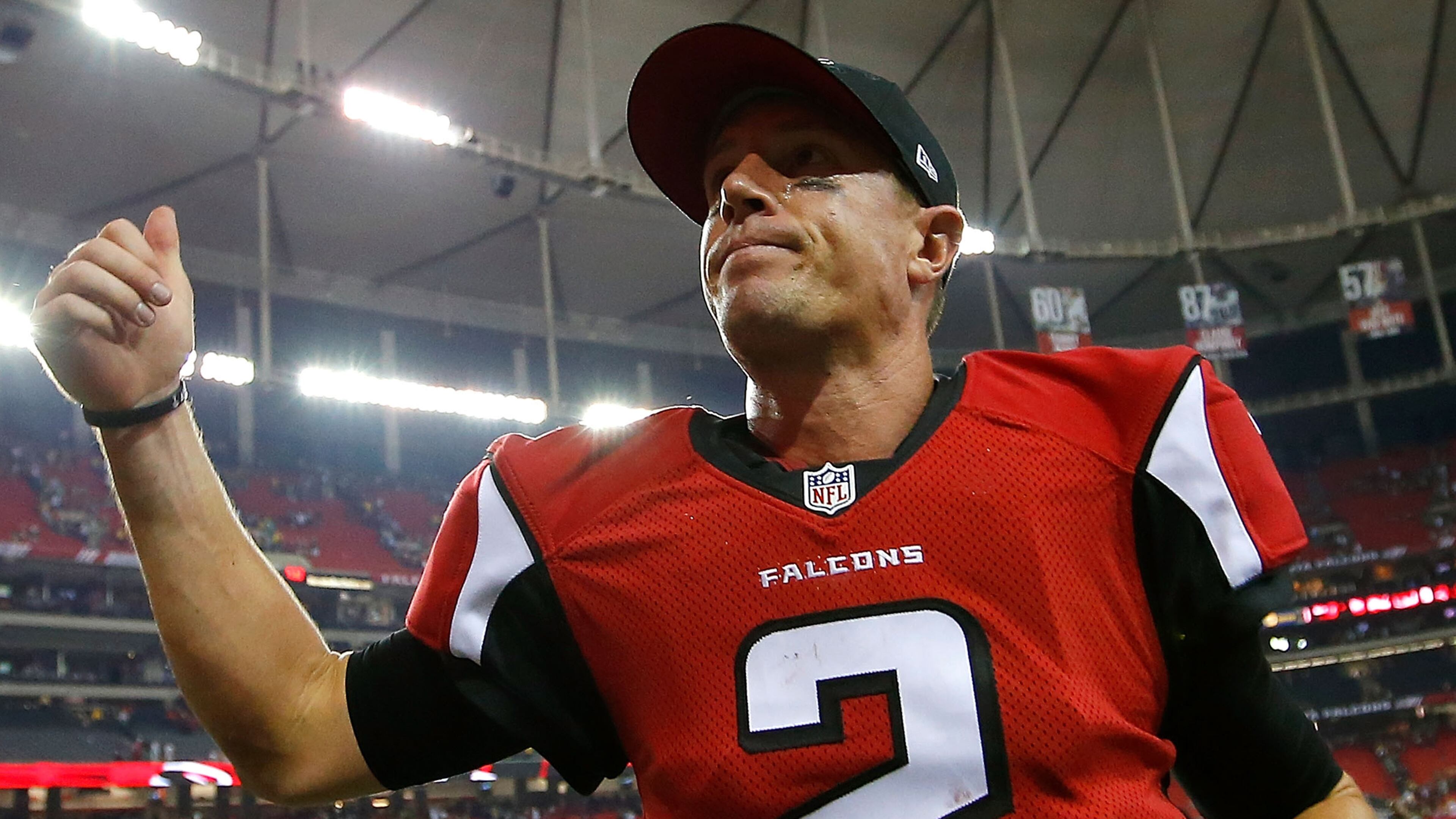 Falcons quarterback Matt Ryan runs off the field after defeating the Green Bay Packers at the Georgia Dome.