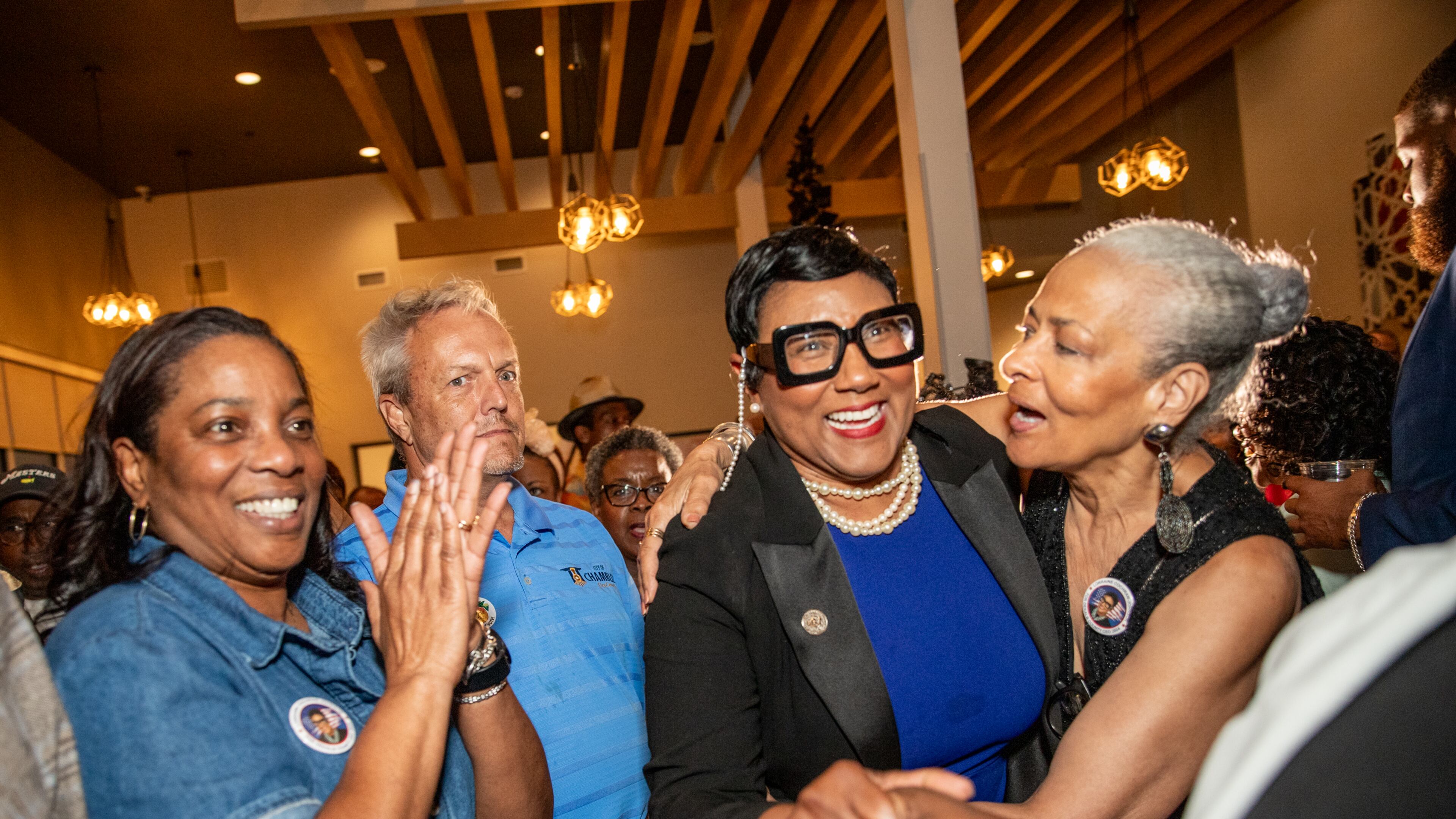 Former Commissioner Lorraine Cochran-Johnson (second from right) will be the next chief executive officer of DeKalb County.
