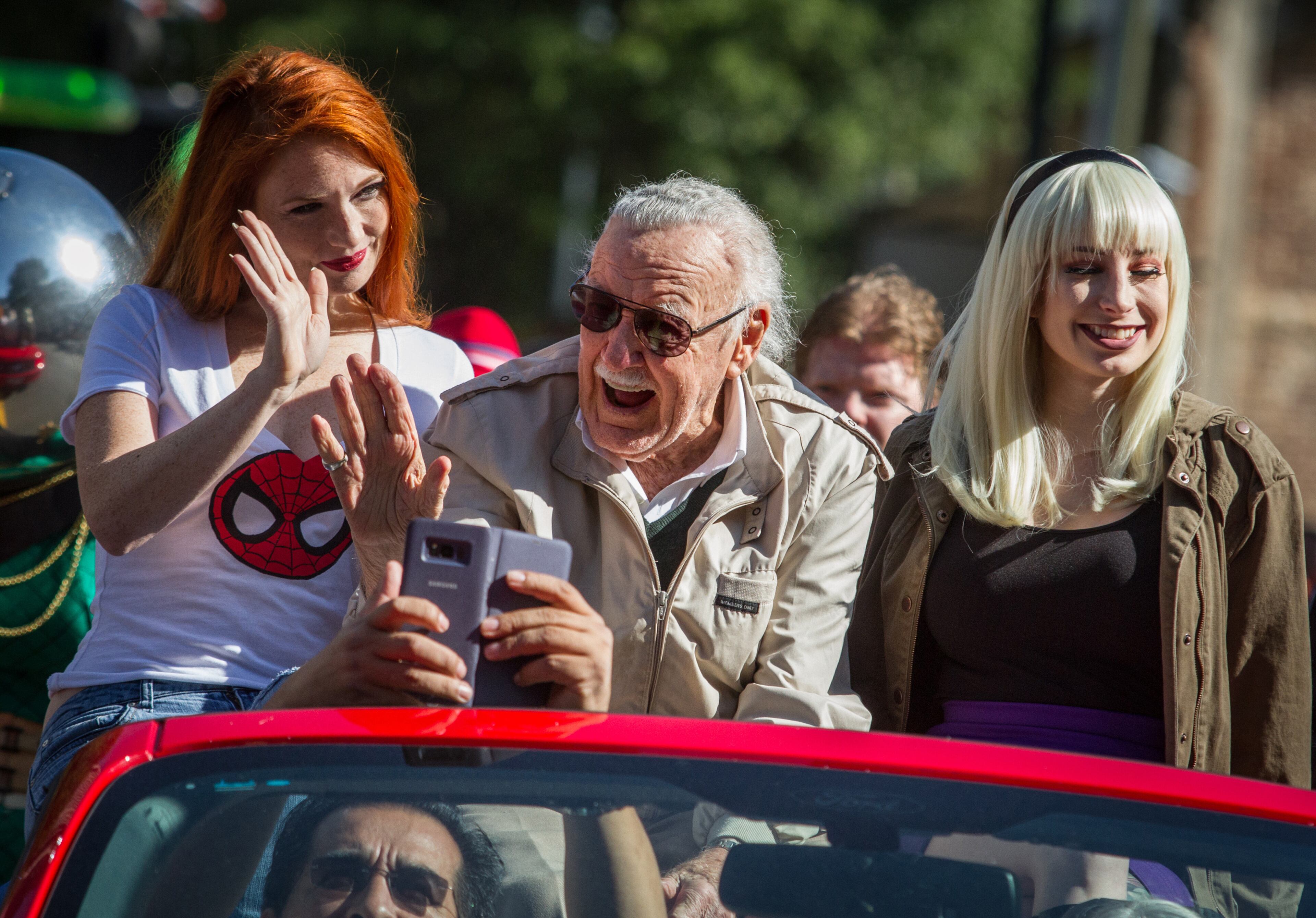 Dragon Con's Grand Marshal Stan Lee waves to the crowd as he makes his way up Peachtree Street during the Dragon Con parade Saturday, September 2, 2017. Lee was formerly editor-in-chief of Marvel Comics. STEVE SCHAEFER / SPECIAL TO THE AJC