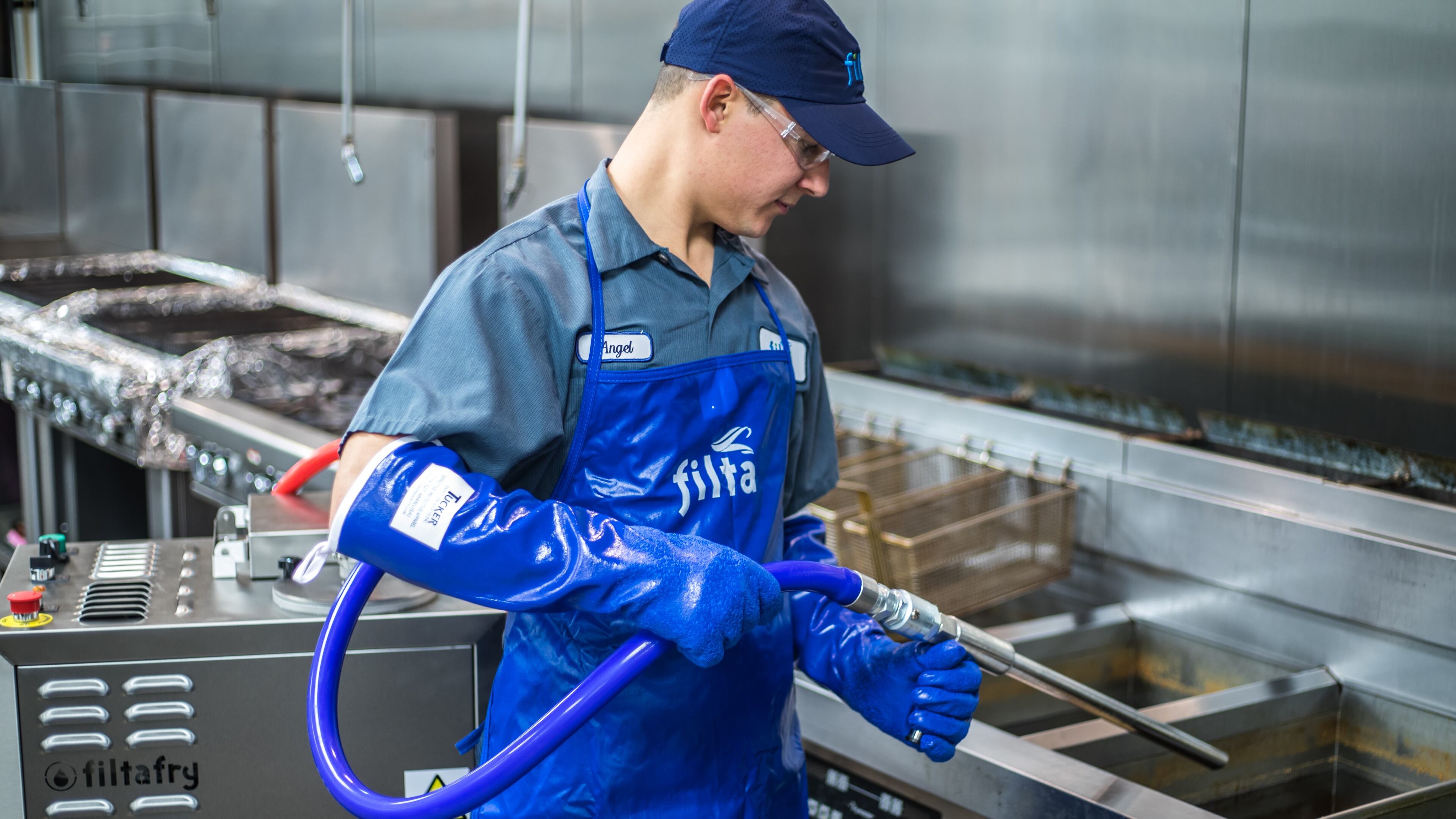 Worker for Athens-based Filta Environmental Kitchen Solutions, which filters and deep-cleans fryers in commercial kitchens,
