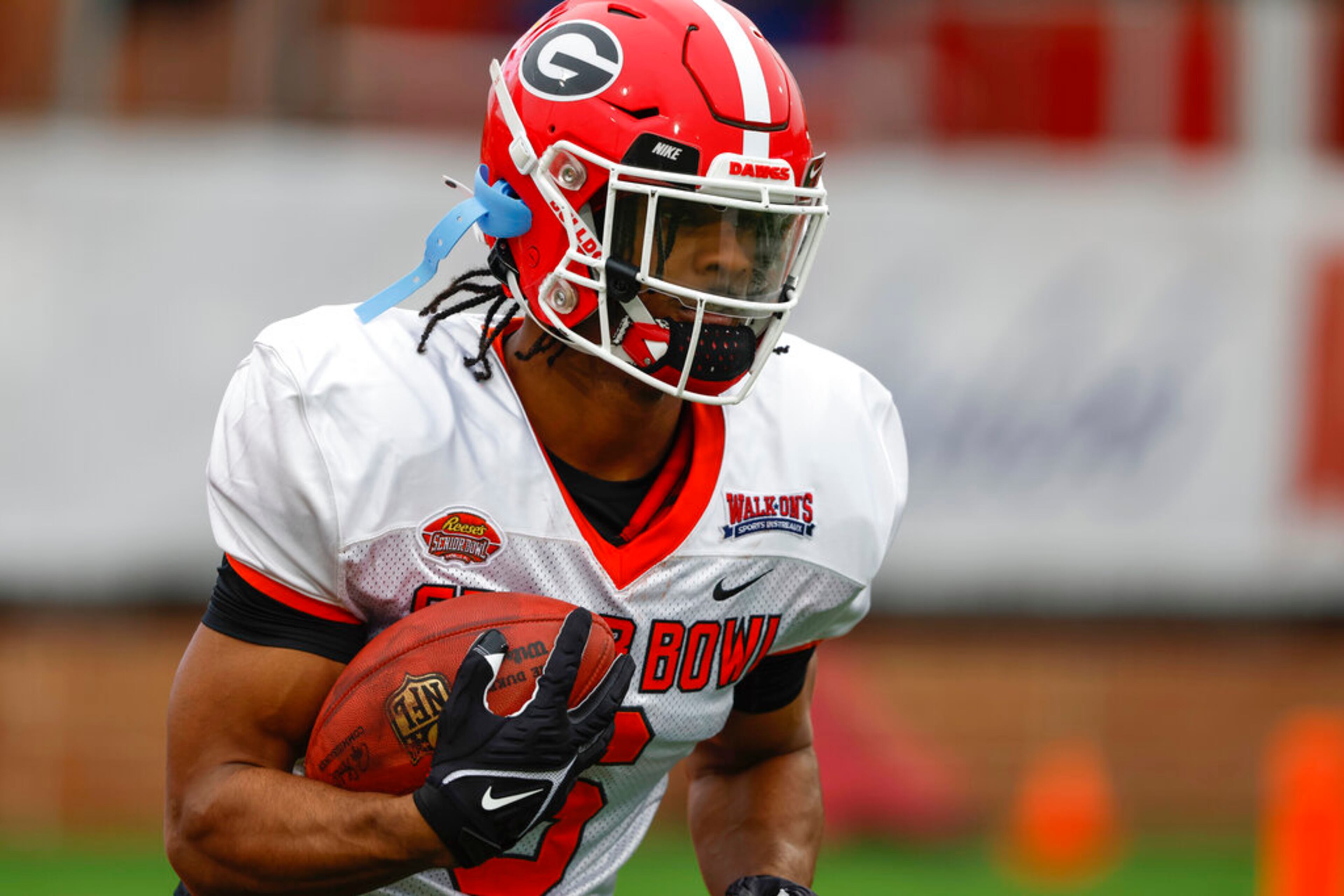 American running back Kenny McIntosh of Georgia (6) runs through drills during practice for the Senior Bowl NCAA college football game Thursday, Feb. 2, 2023, in Mobile, Ala.. (AP Photo/Butch Dill)