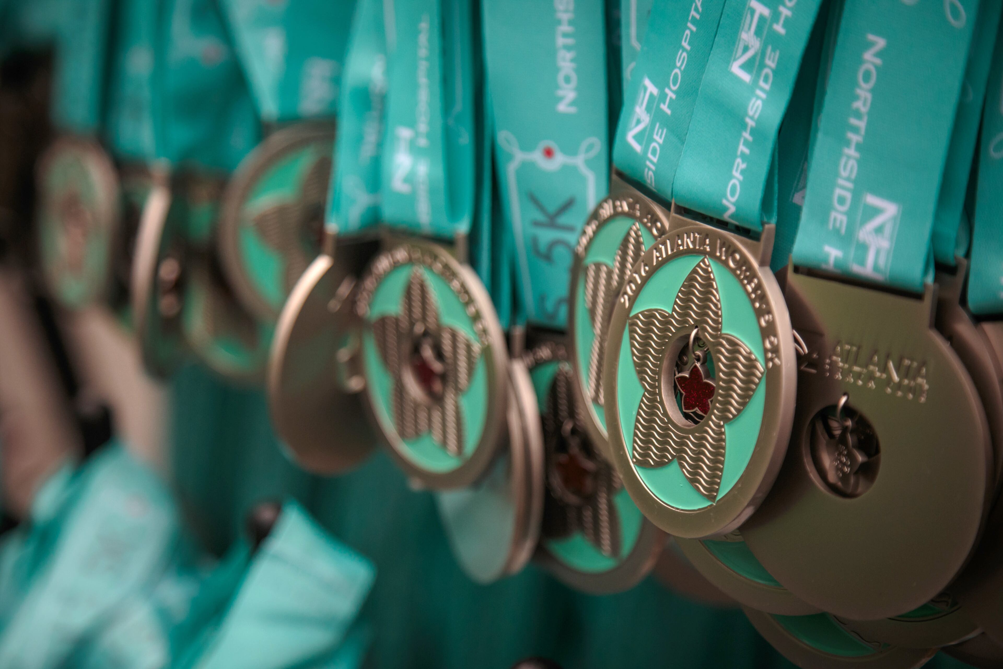 Participant medals are ready to be handed out to all the Runners before the 2016 Atlanta Women's 5K run/walk on Saturday, March 26, 2016, in Atlanta, GA. STEVE SCHAEFER / SPECIAL TO THE AJC