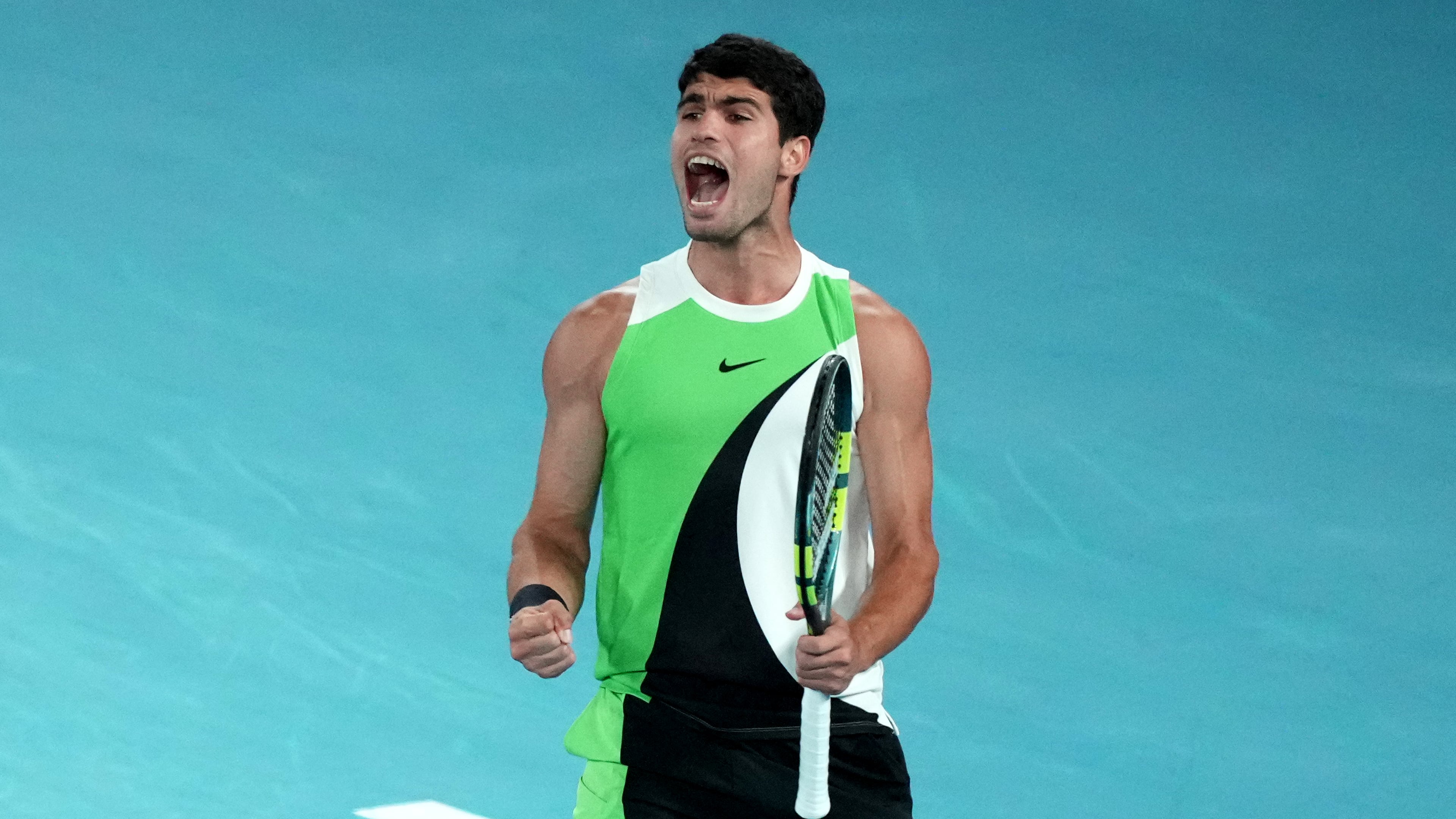 Carlos Alcaraz of Spain reacts during the men's singles final match against Novak Djokovic of Serbia at the Australian Open tennis championship in Melbourne, Australia, Sunday, Feb. 1, 2026.(AP Photo/Mark Baker)