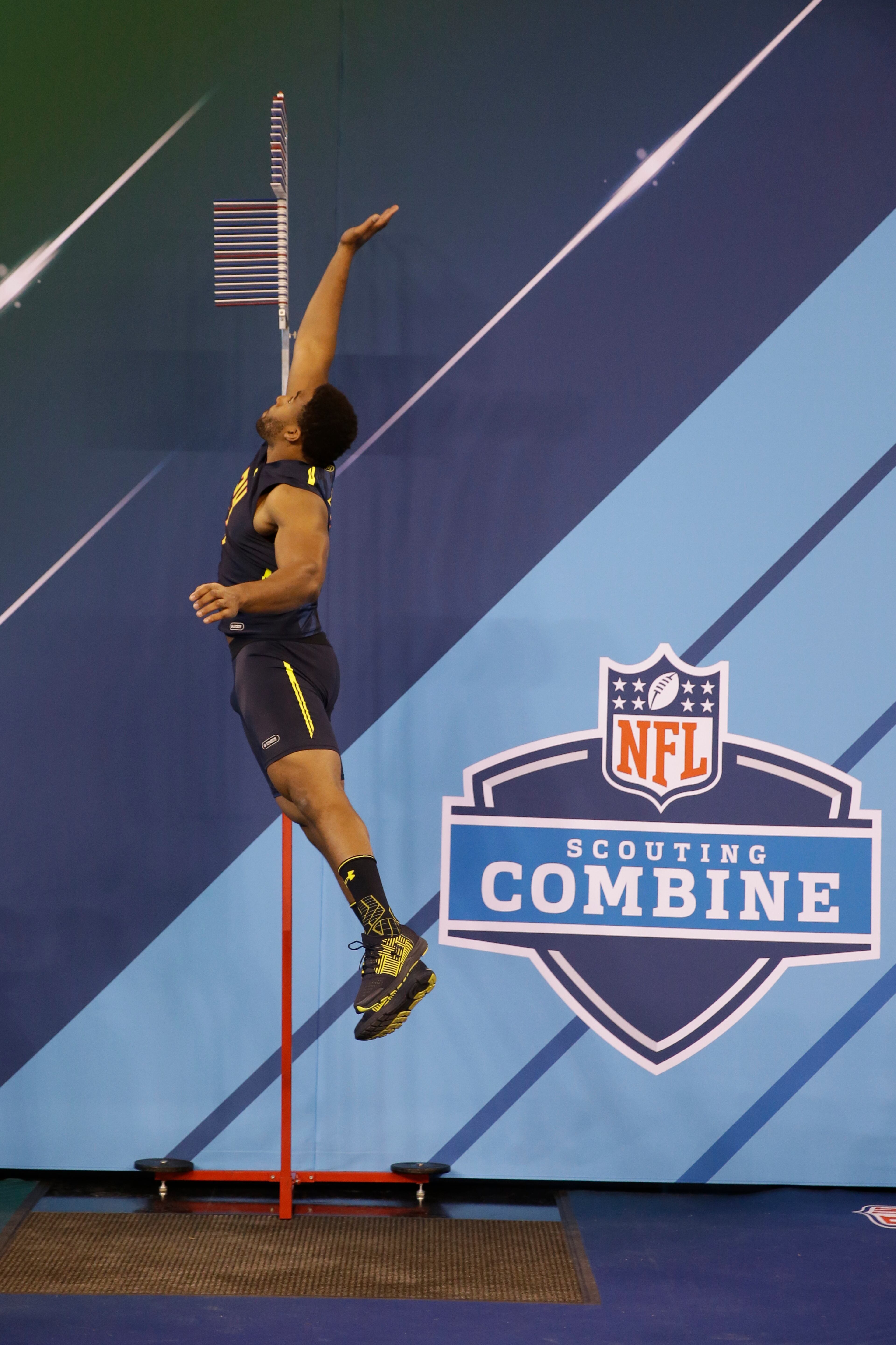 Pittsburgh offensive lineman Dorian Johnson does the vertical jump at the NFL football scouting combine in Indianapolis, Friday, March 3, 2017. (AP Photo/Michael Conroy)