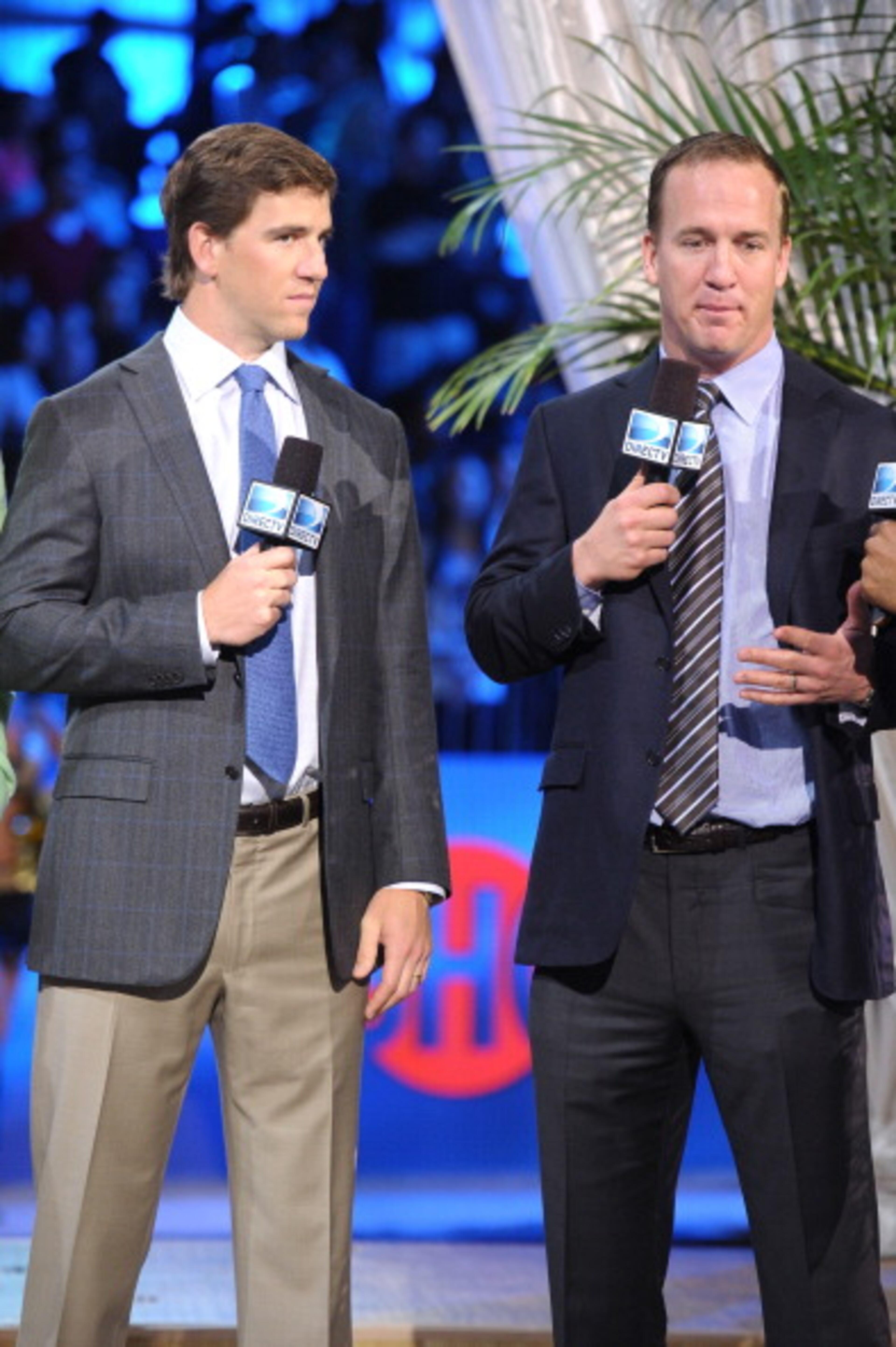 NEW ORLEANS, LA - FEBRUARY 02: Eli Manning and Peyton Manning attend DIRECTV'S Seventh Annual Celebrity Beach Bowl at DTV SuperFan Stadium at Mardi Gras World on February 2, 2013 in New Orleans, Louisiana. (Photo by Michael Loccisano/Getty Images For DirecTV)