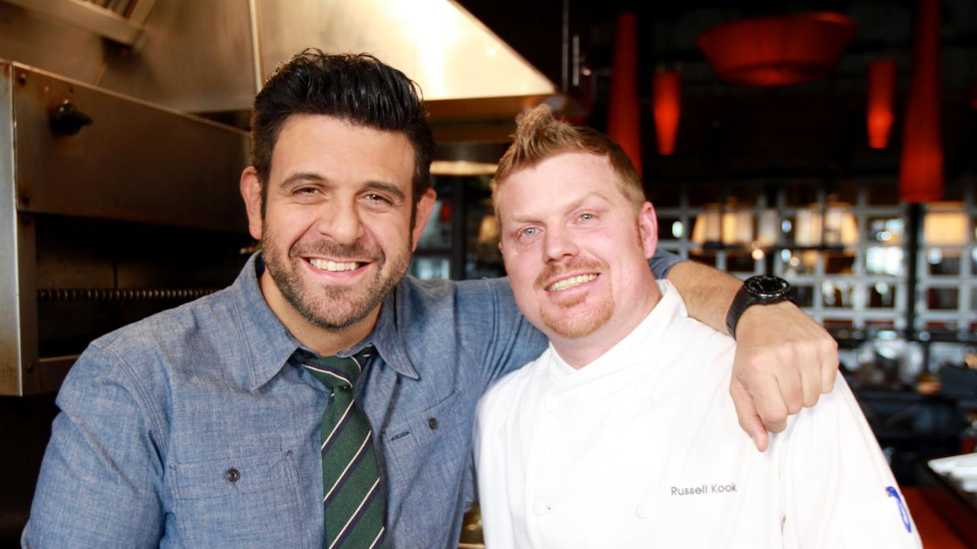 Adam Richman at TWO Urban Licks with then sous chef Russell Kook. (This was taped in January, 2014.) CREDIT: Travel Channel