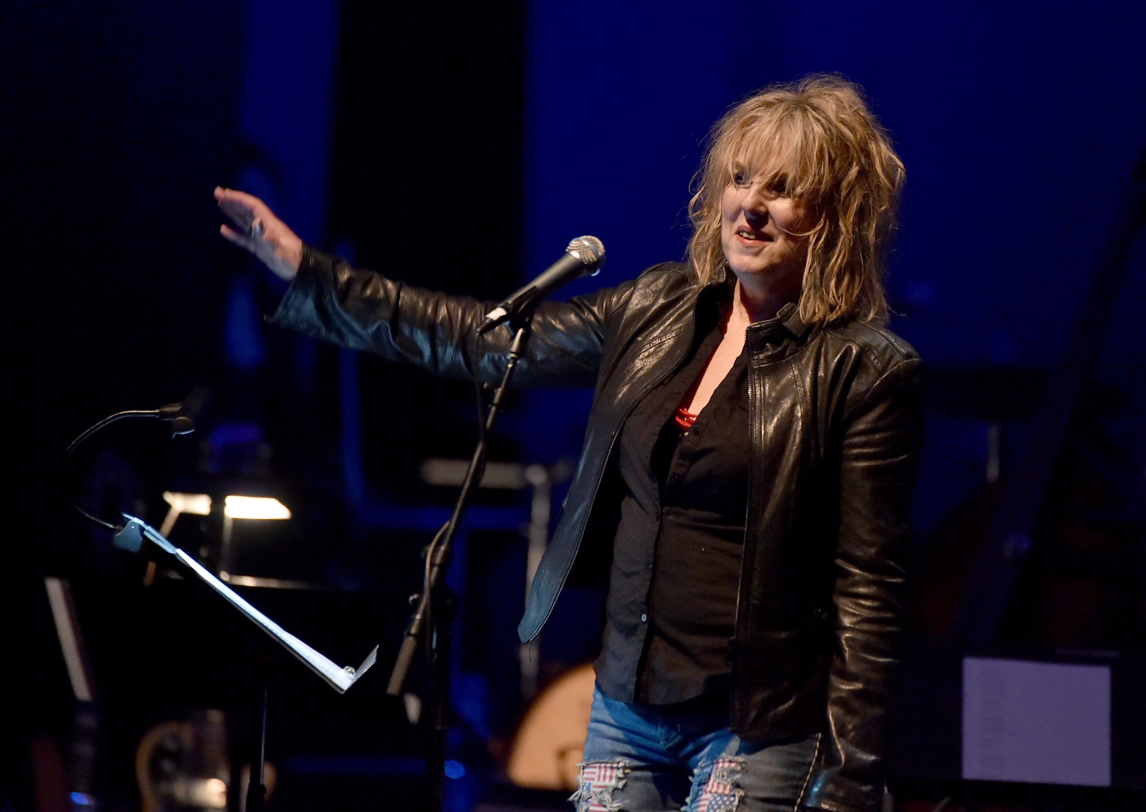 LOS ANGELES, CA - APRIL 07: Musician Lucinda Williams performs onstage during The David Lynch Foundation's DLF Live Celebration of the 60th Anniversary of Allen Ginsberg's "HOWL" with Music, Words, and Funny People at The Theatre at Ace Hotel on April 7, 2015 in Los Angeles, California. (Photo by Kevin Winter/Getty Images)