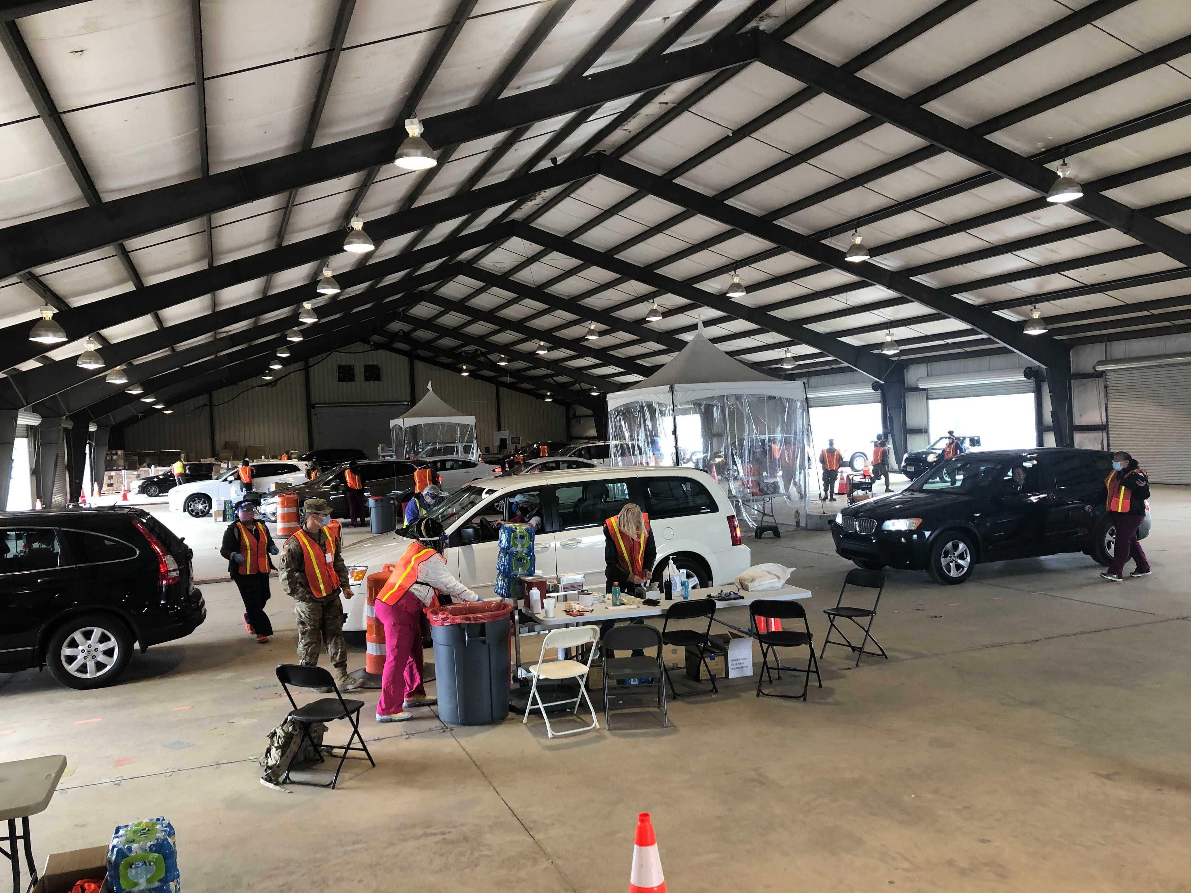 Operations at the mass vaccination site at Habersham County Fairgrounds in Clarkesville went smoothly Monday. With expanded eligibility, the daily number of vaccines administered was more than doubled to 2,100, the site manager said. (Helena Oliviero / Helena.Oliviero@ajc.com)