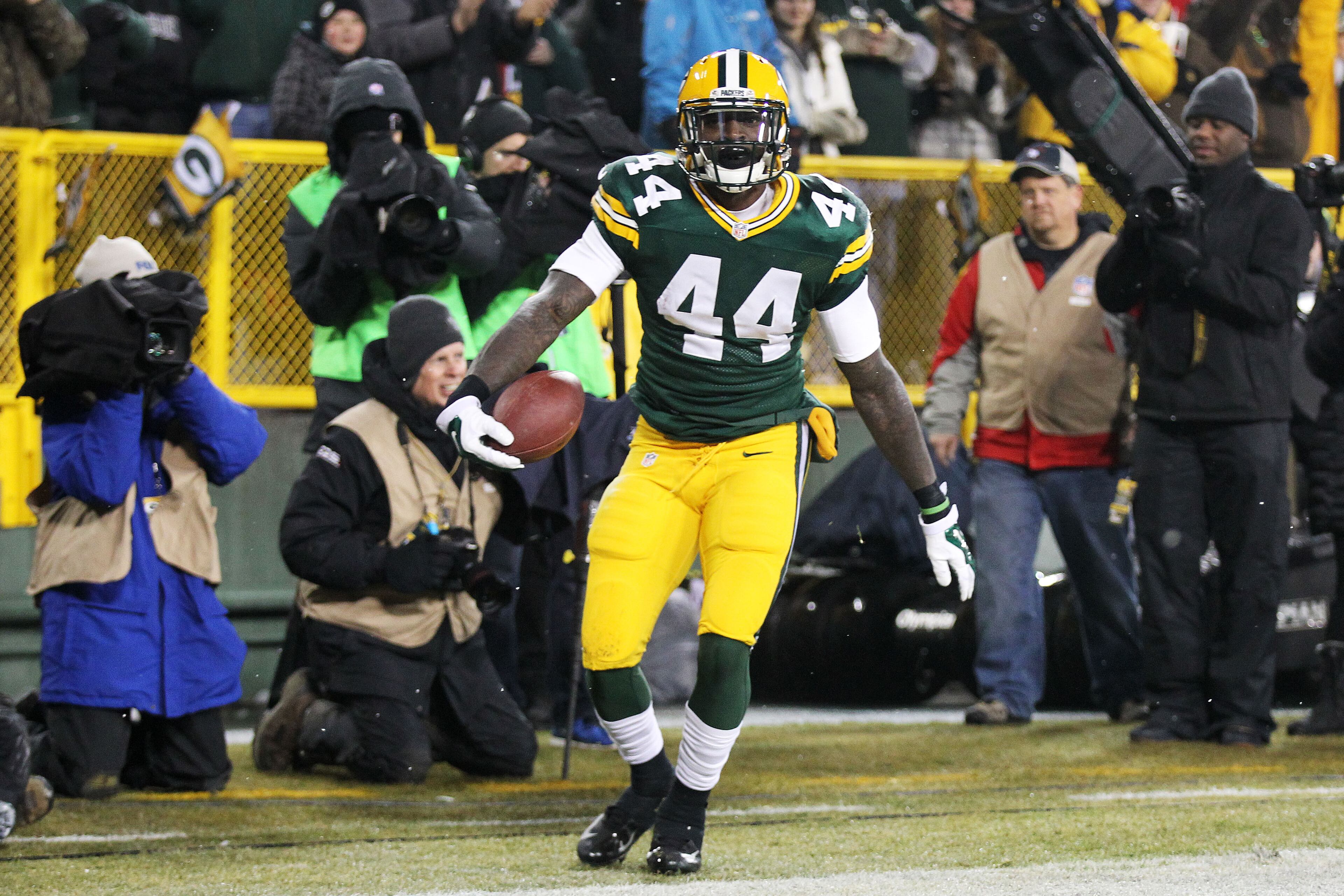 James Starks #44 of the Green Bay Packers celebrates his touchdown in the first quarter against the Atlanta Falcons at Lambeau Field on Dec. 8, 2014 in Green Bay, Wis.