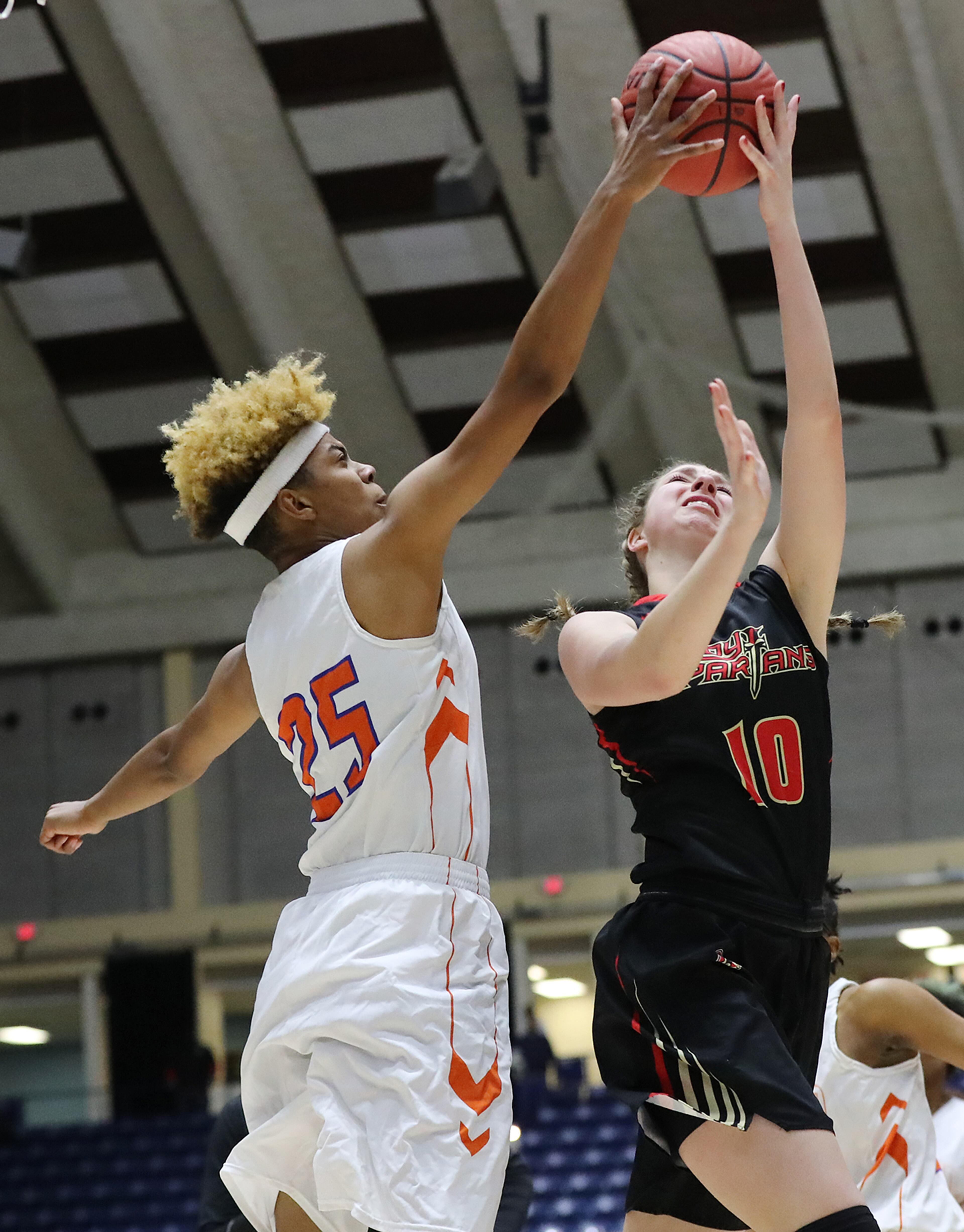 March 8, 2018 Macon: GAC center MaryMartha Turner has he shot blocked by Johnson-Savannah center Giana Copeland, one of 8 blocked shots by Copeland in the first half, in their GHSA state basketball championship game on Thursday, March 8, 2018, in Macon. Curtis Compton/ccompton@ajc.com