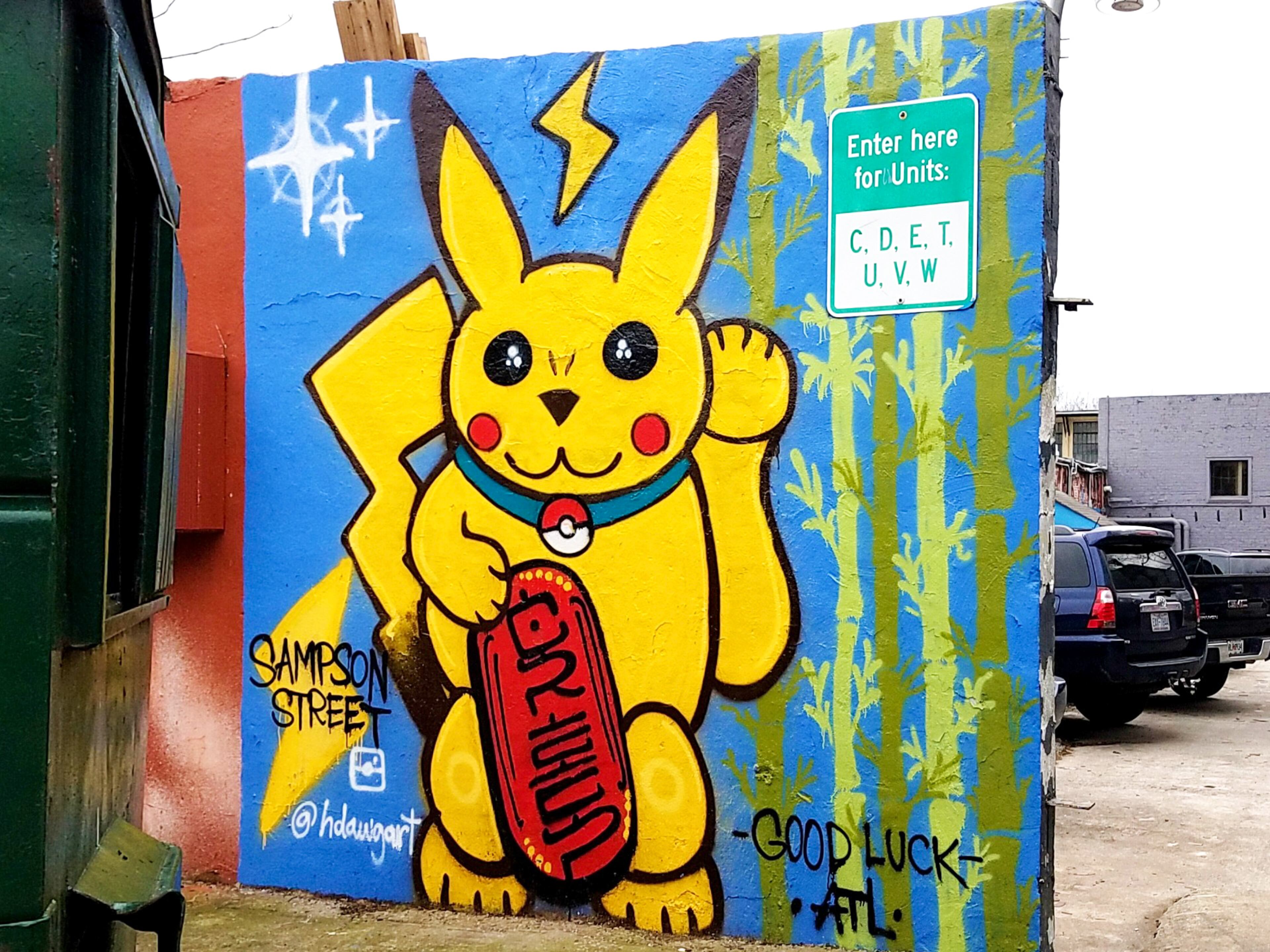 Pikachu, we hardly knew you! H Dawg painted the Pokémon character in the form of a Japanese Maneki-Neko cat in a mural at the entrance to Sampson Lofts on John Wesley Dobbs Avenue. Courtesy of Arthur Rudick