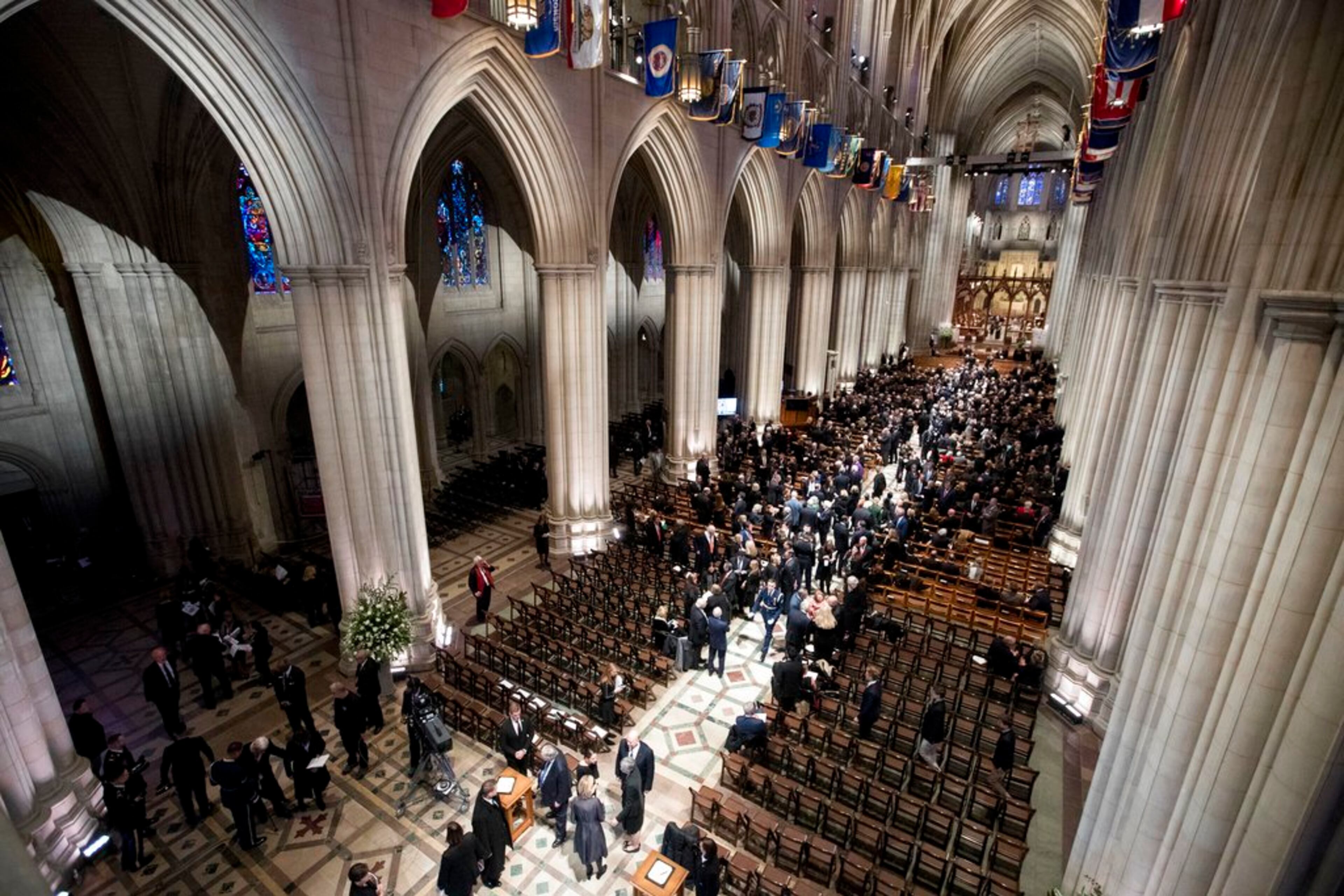 People arrive for a State Funeral for former President George H.W. Bush at the National Cathedral, Wednesday, Dec. 5, 2018, in Washington. (AP Photo/Andrew Harnik, Pool)