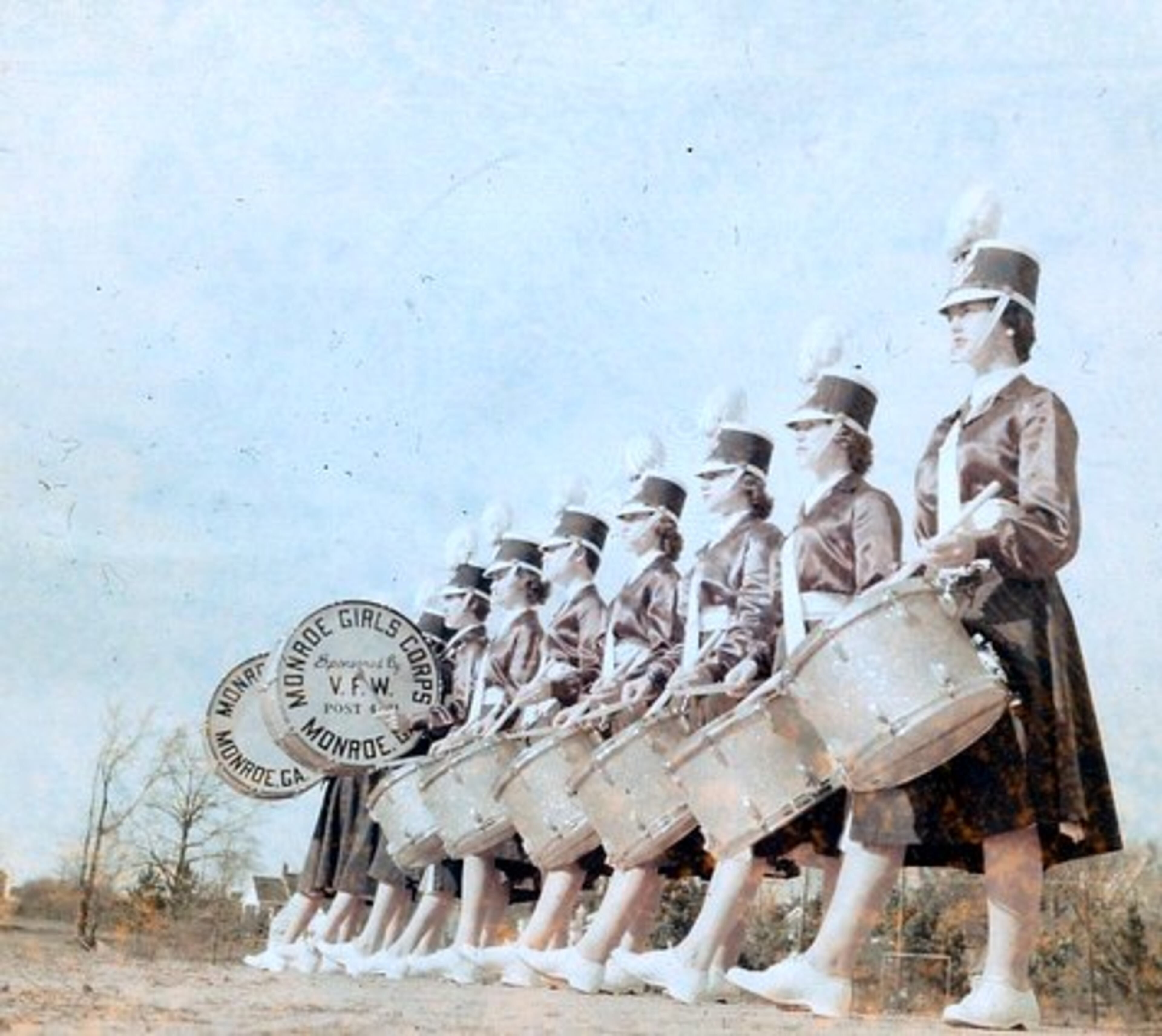 For years, the Monroe Girls Drum and Bugle Corps donned their plumed shakos and purple uniforms and quick-stepped their way into the hearts of parade and festival-goers across the country. They disbanded in 1983 but will return Dec. 6 as co-grand marshals of the city's 60th annual Christmas parade.