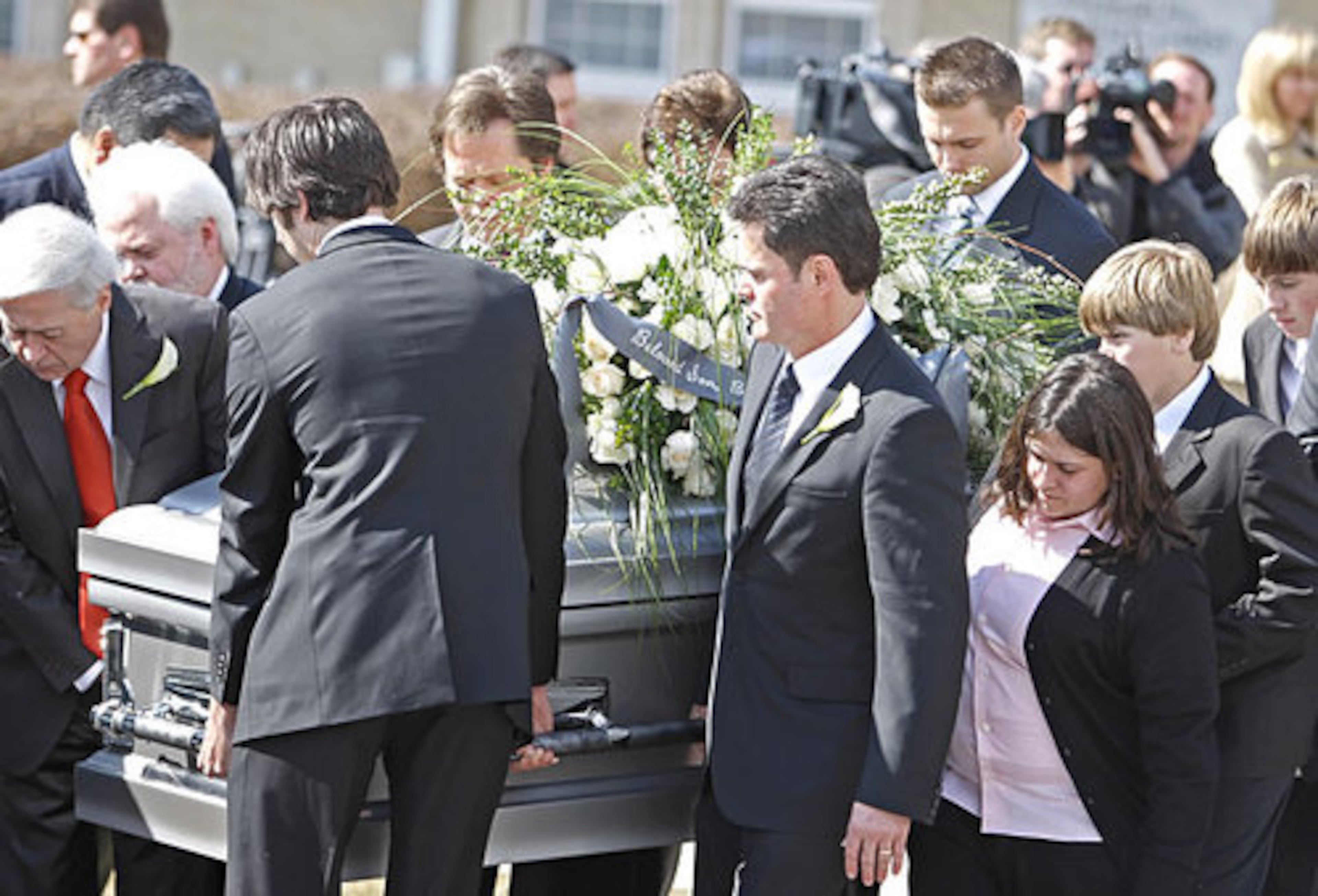 Donny Osmond, center right, and members of the Osmond family escort the casket of his nephew Michael Bryan at the East Lawn Memorial Hills Cemetery in Provo.