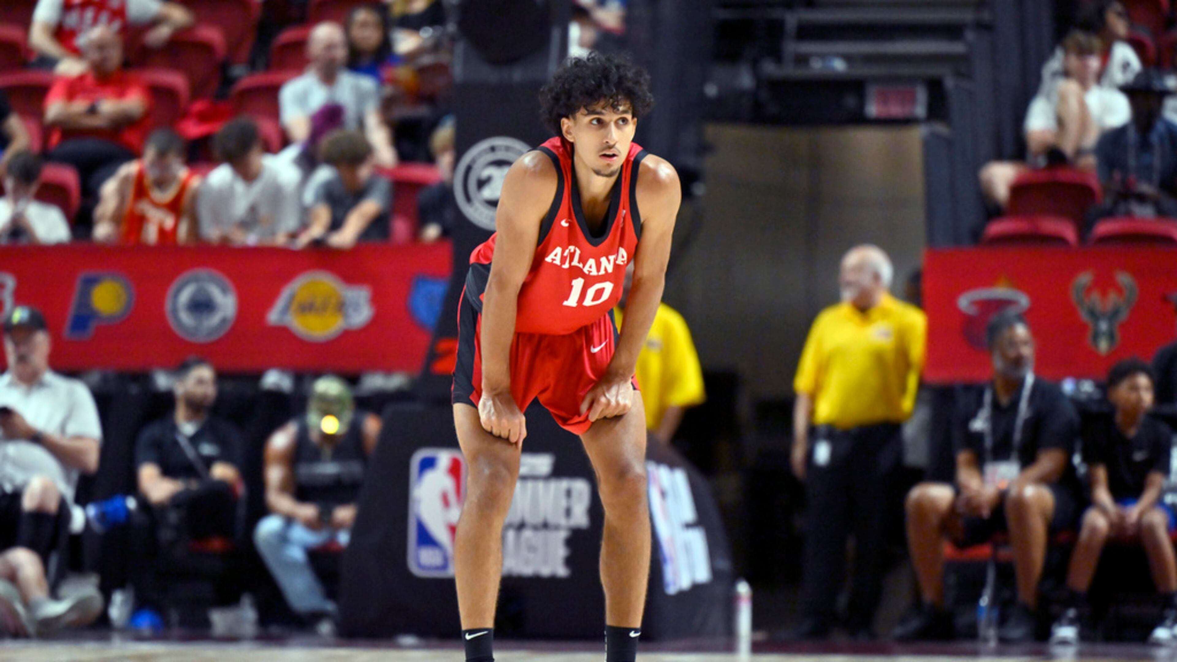 Atlanta Hawks forward Zaccharie Risacher (10) looks on from midcourt during the second half of an NBA summer league basketball game against the Washington Wizards Friday, July 12, 2024, in Las Vegas. (AP Photo/David Becker)