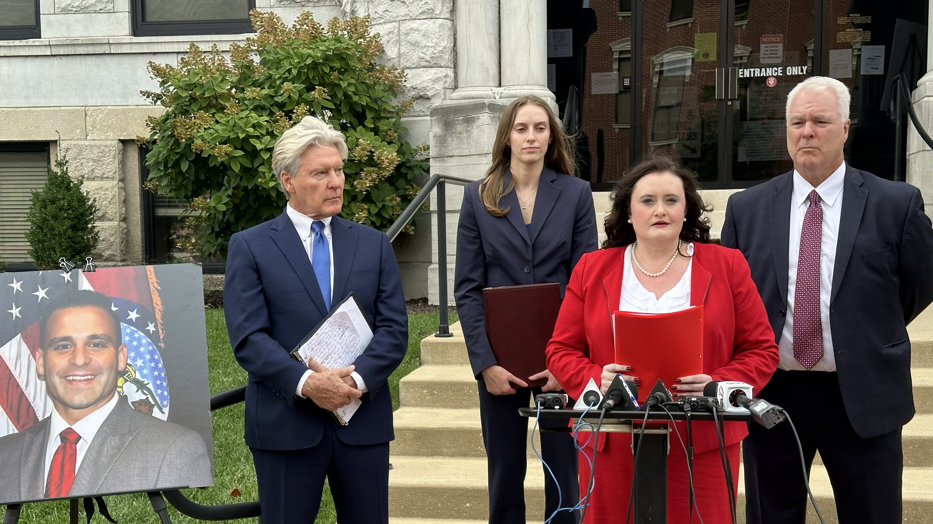 This photo taken with a smartphone shows attorney Erin N. Vernon speaking with reporters Monday, Sept. 14, 2026, at the Cole County Courthouse in Jefferson City, Mo. (AP Photo/David A. Lieb)