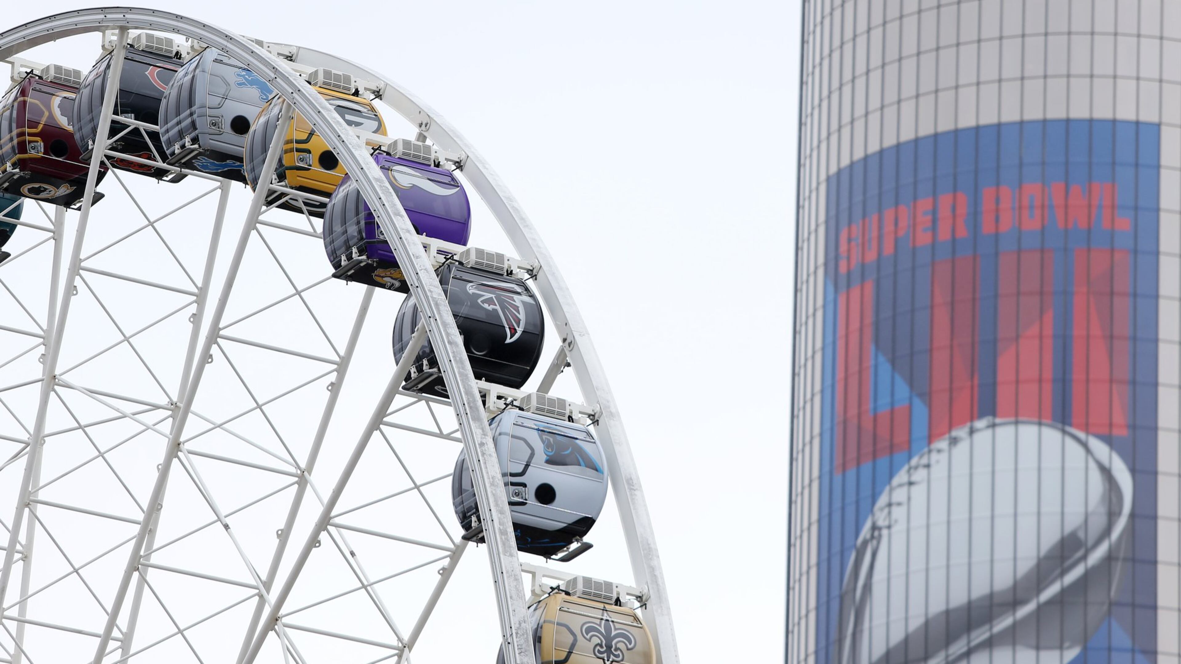 1/24/19 - Atlanta - Each pod on Sky View Atlanta is decorated with a different NFL team. The City of Atlanta is covered in Super Bowl advertisements as the big day approaches next week. You can find billboards, signage and more around the city. EMILY HANEY / emily.haney@ajc.com