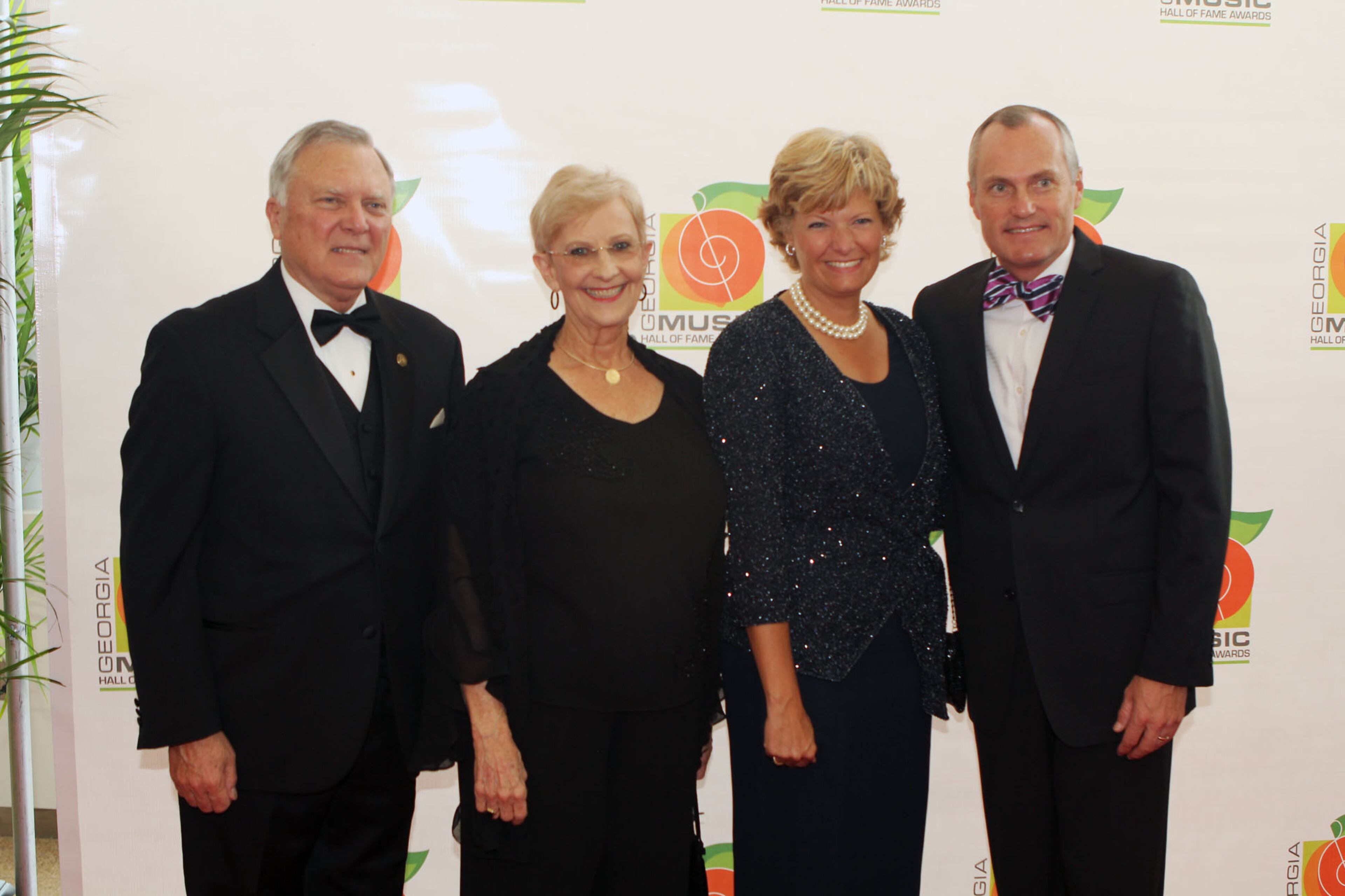 Gov. Nathan Deal (from left), wife Sandra, Nita Cagle and her husband Lt. Gov. Casey Cagle appear on the red carpet at the Georgia Music Hall of Fame event at the Cobb Energy Performing Arts Centre on Sunday, Oct. 14, 2012.