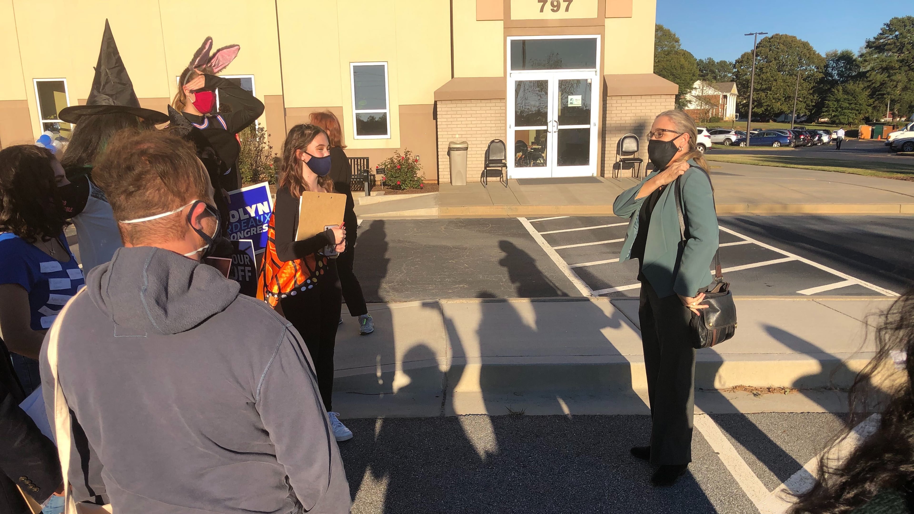 Democrat Carolyn Bourdeaux, a candidate for Georgia's 7th Congressional District seat, chats with supporters during an event at Pleasant Hills Baptist Church in Lawrenceville on Friday, Oct. 30, 2020. (Tia Mitchell/The Atlanta Journal-Constitution)