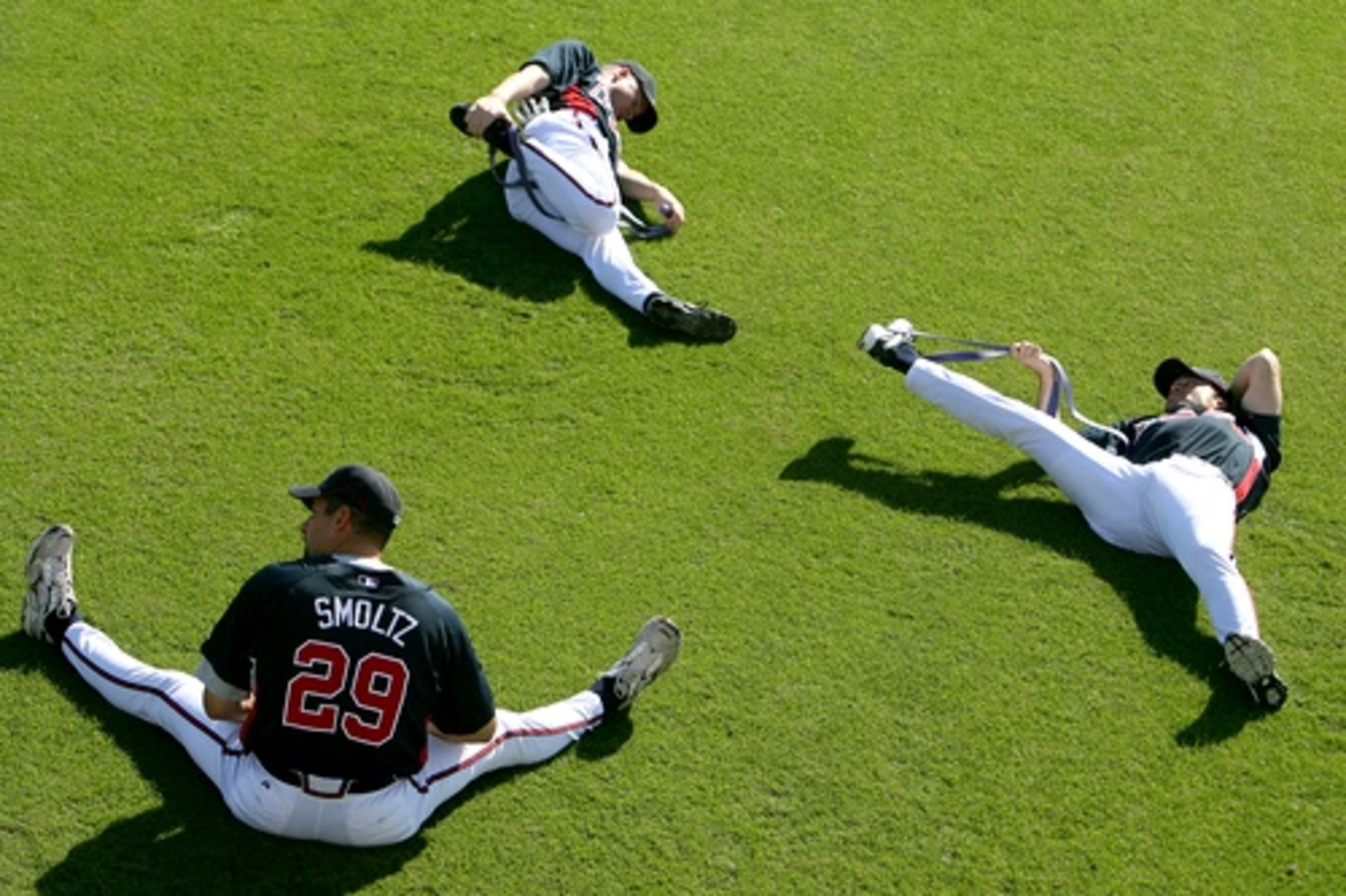 Pitchers John Smoltz, Tom Glavine and Mike Hampton during morning stretch.