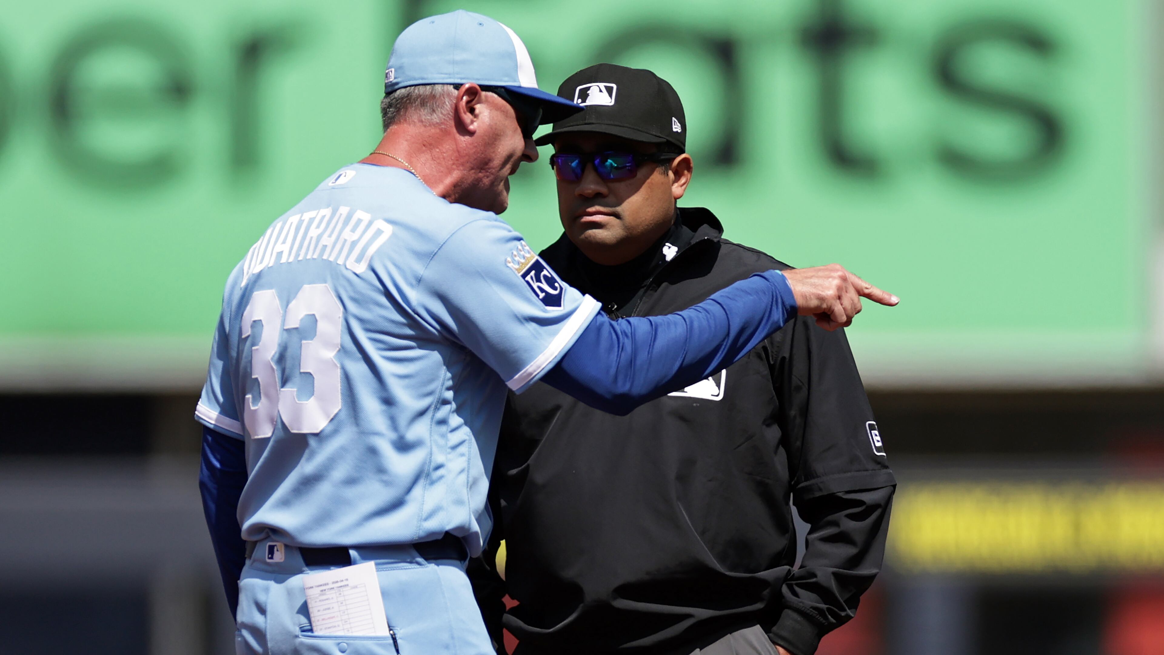 Kansas City Royals manager Matt Quatraro (33) argues with second base umpire Nestor Ceja during the first inning of a baseball game against the New York Yankees, Saturday, April 18, 2026, in New York. (AP Photo/Adam Hunger)