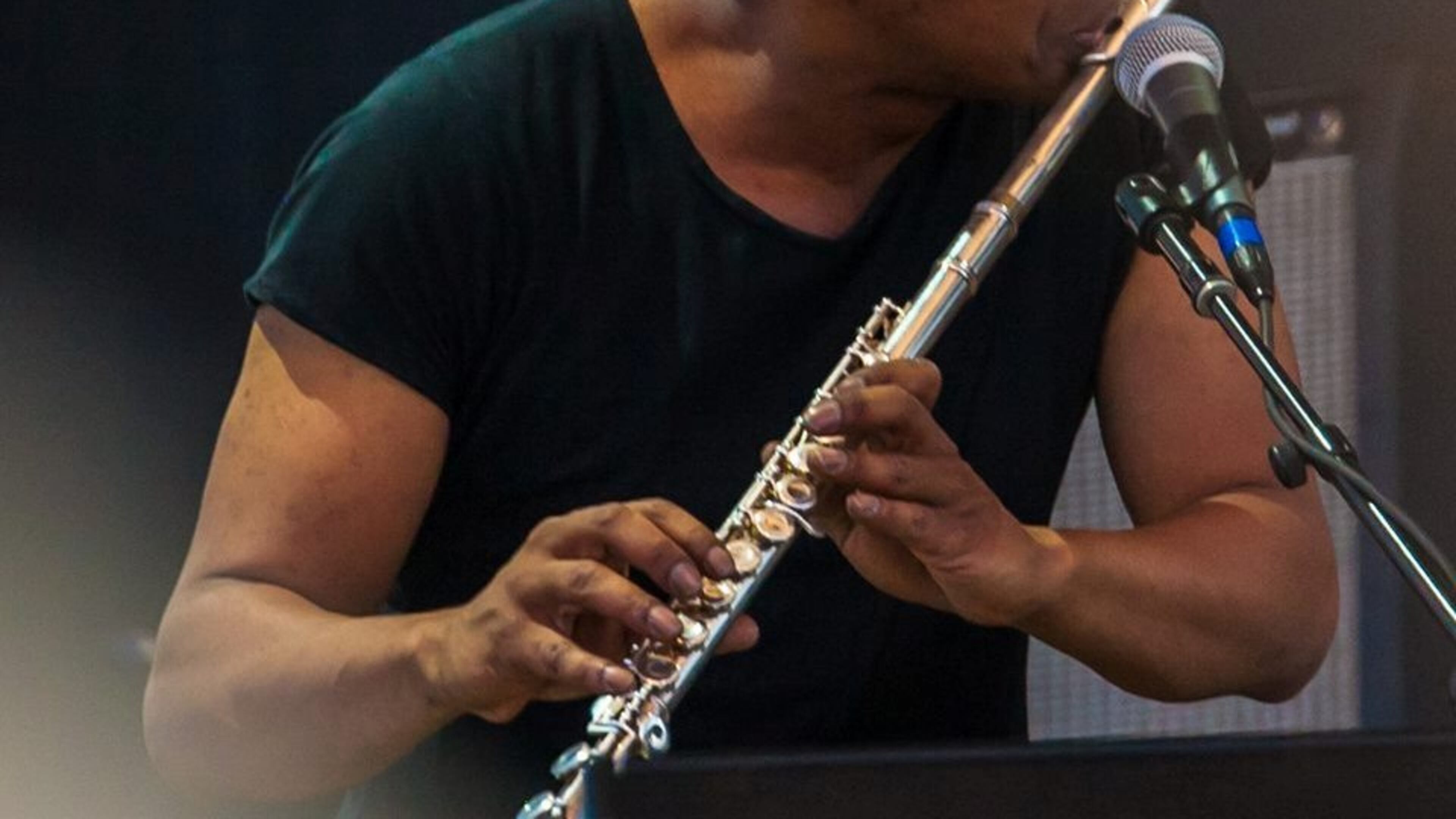 Kofi Burbridge on stage.