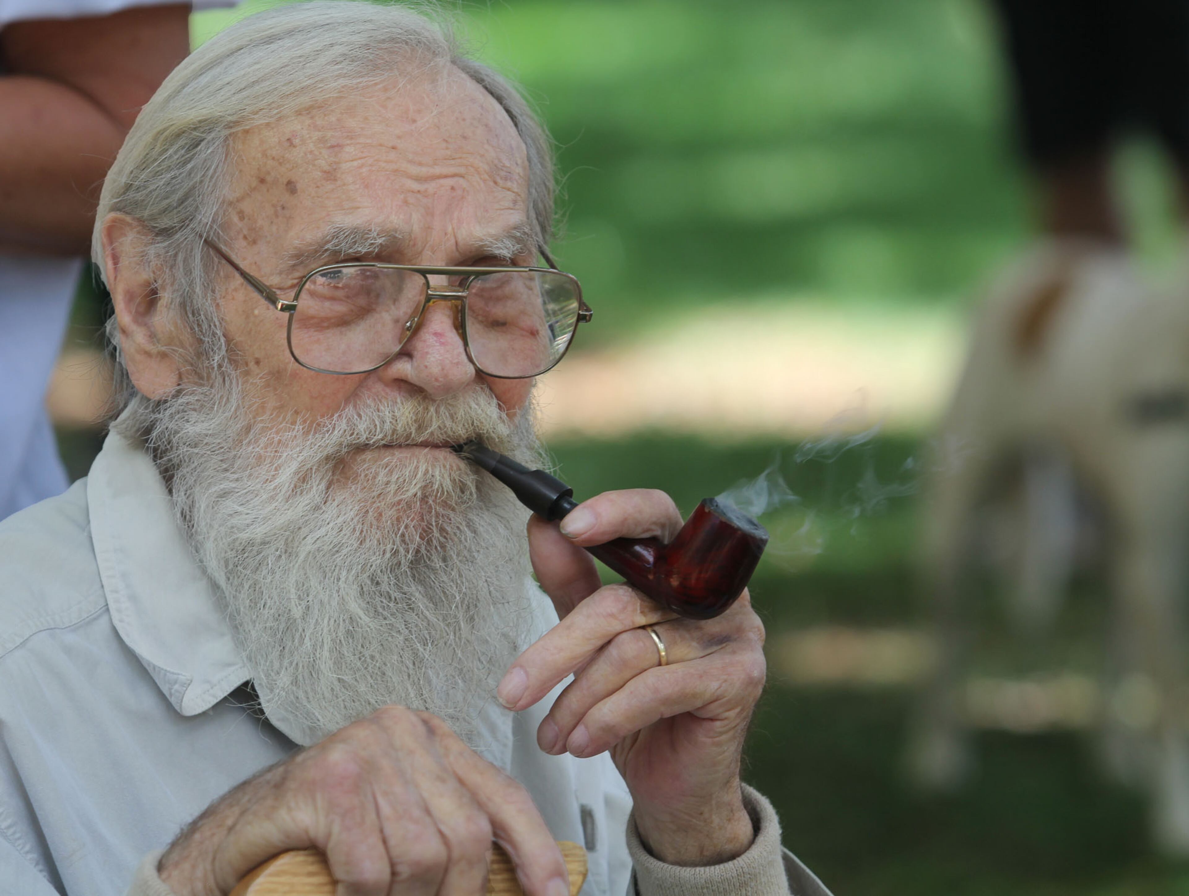 Tibor Cseley, 83, a general in the Hungarian revolution, enjoys watching the festivities of the Atlanta Hungarian Festival on the campus of Agnes Scott College on Sunday, Sept. 22, 2013.