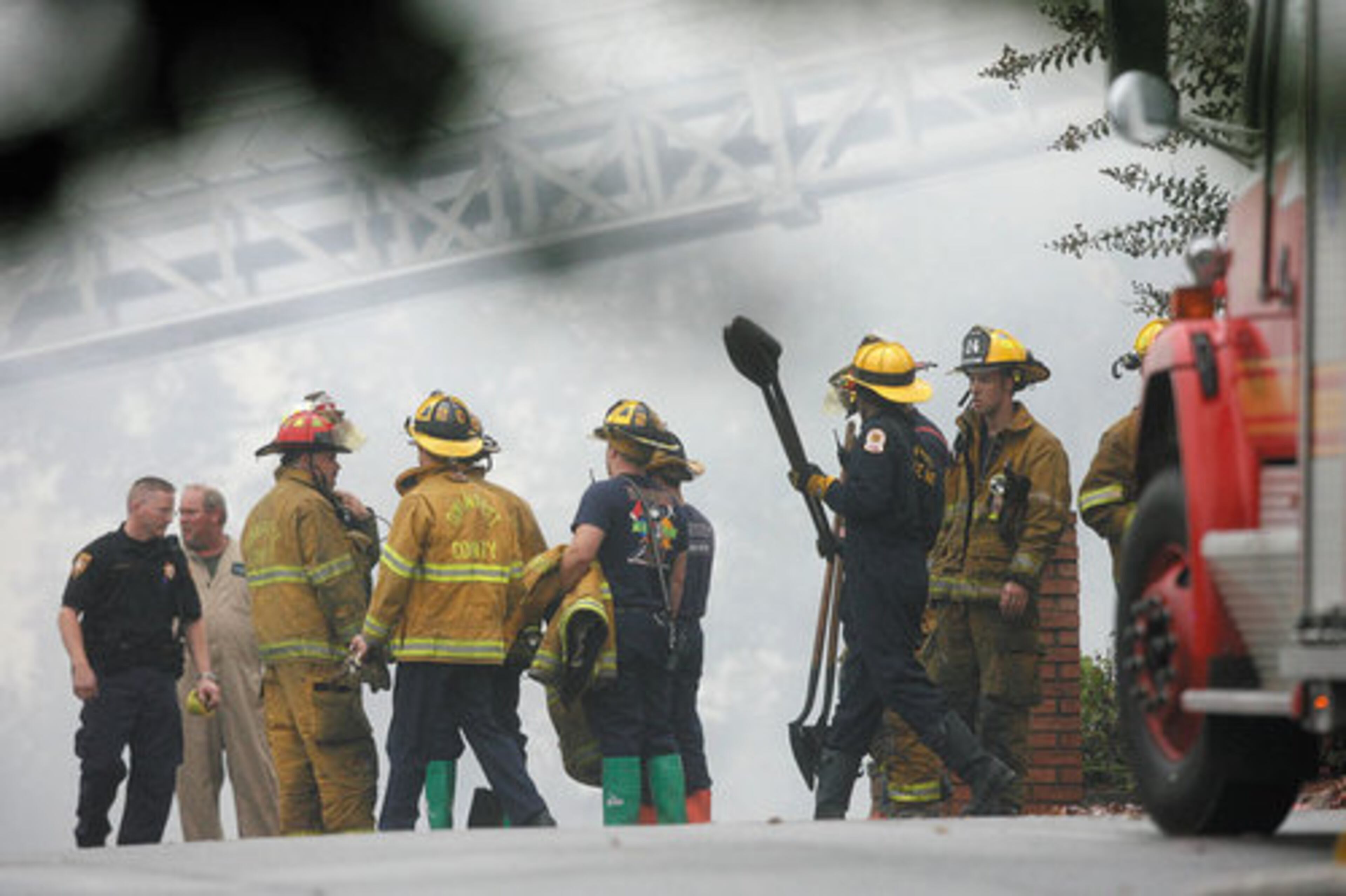 Gwinnett firefighters at the scene of the plane crash.