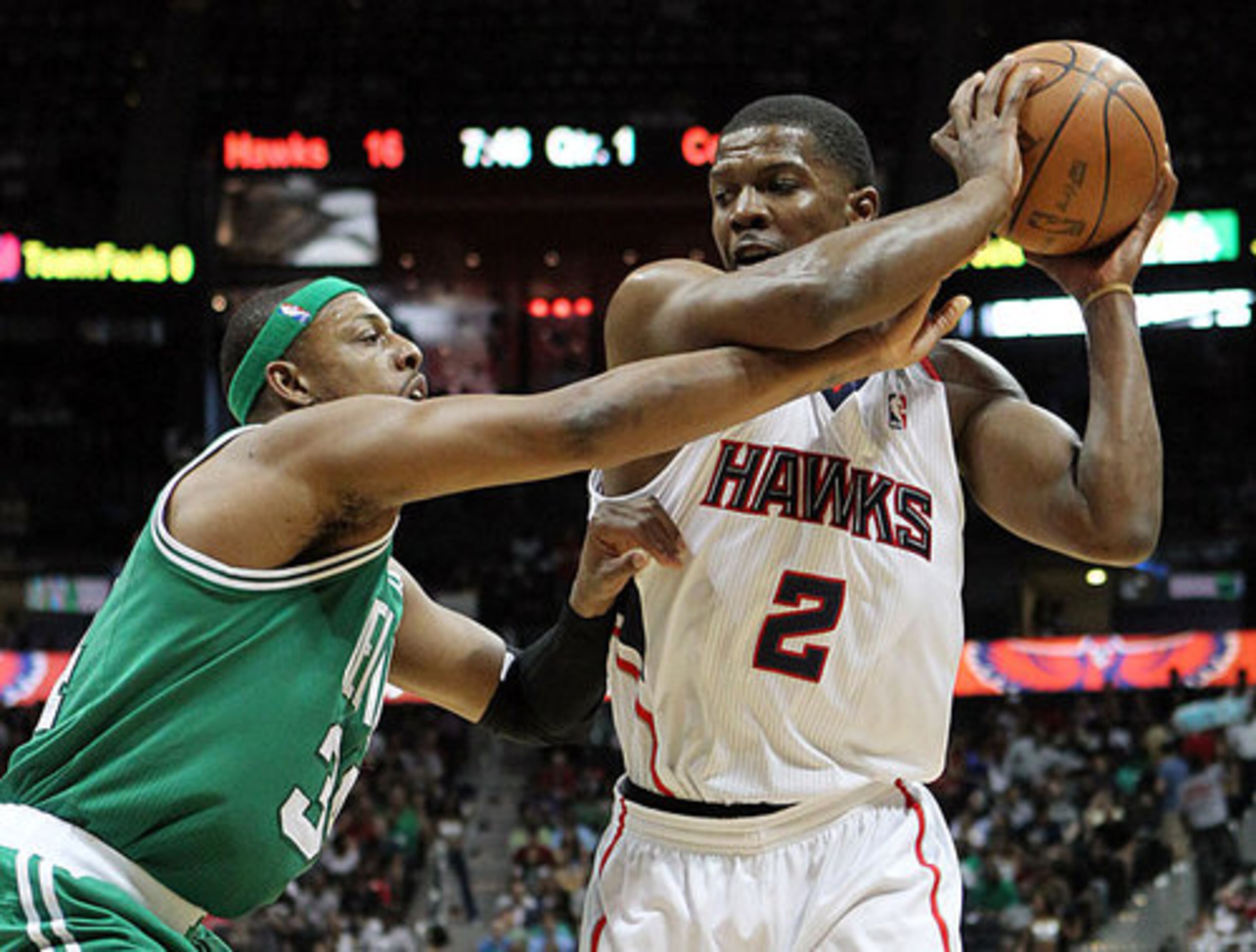 Boston Celtics Paul Pierce defends against Atlanta Hawks Joe Johnson during 1st half action at Philips Arena.
