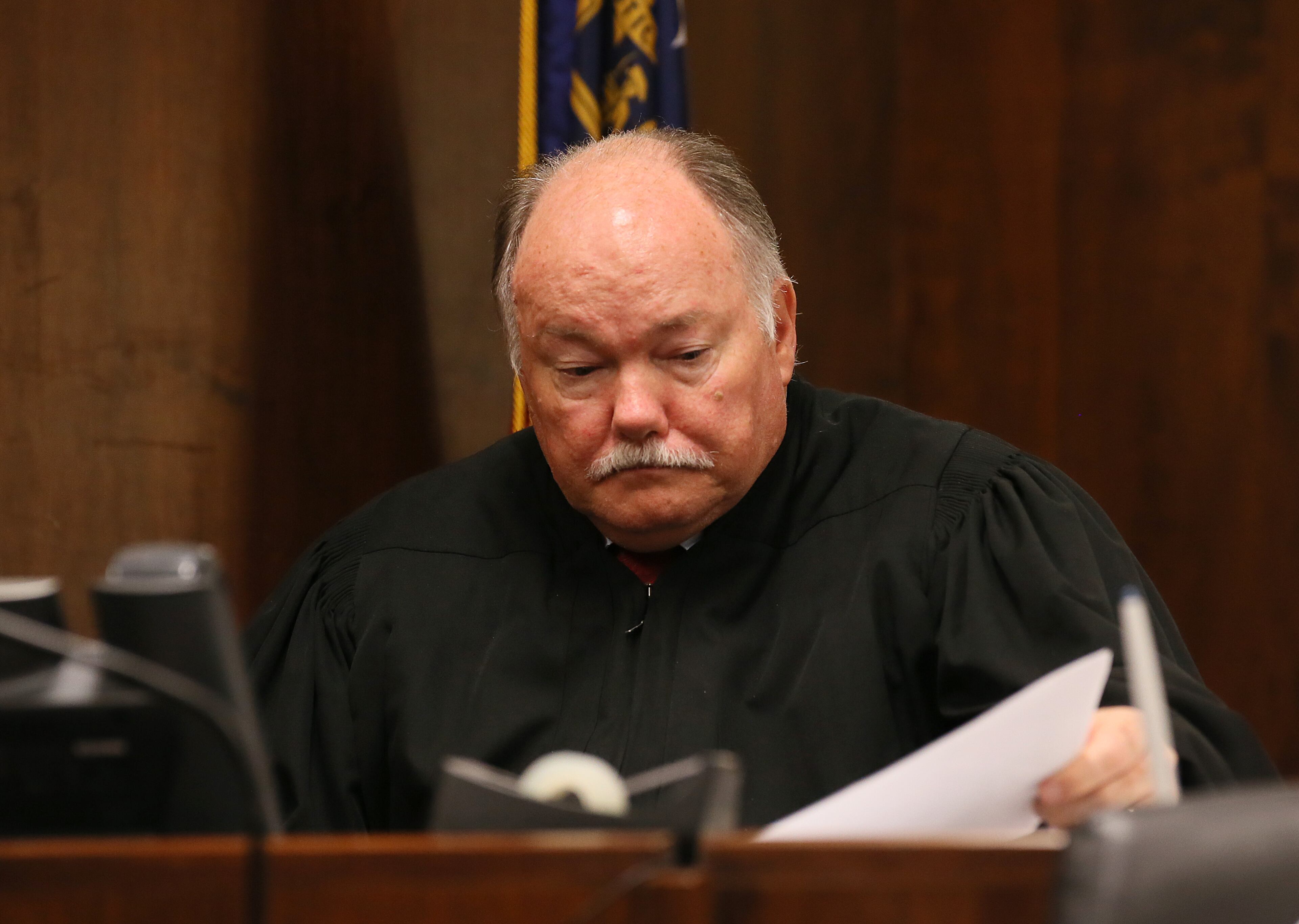 Cobb County Magistrate Court Judge Frank R. Cox listens to testimony during the bond hearing for Justin Ross Harris, the father of a toddler who died after police say he was left in a hot car for about seven hours, Thursday, July 3, 2014, in Marietta, Ga. (AP Photo/Marietta Daily Journal, Kelly J. Huff, Pool)